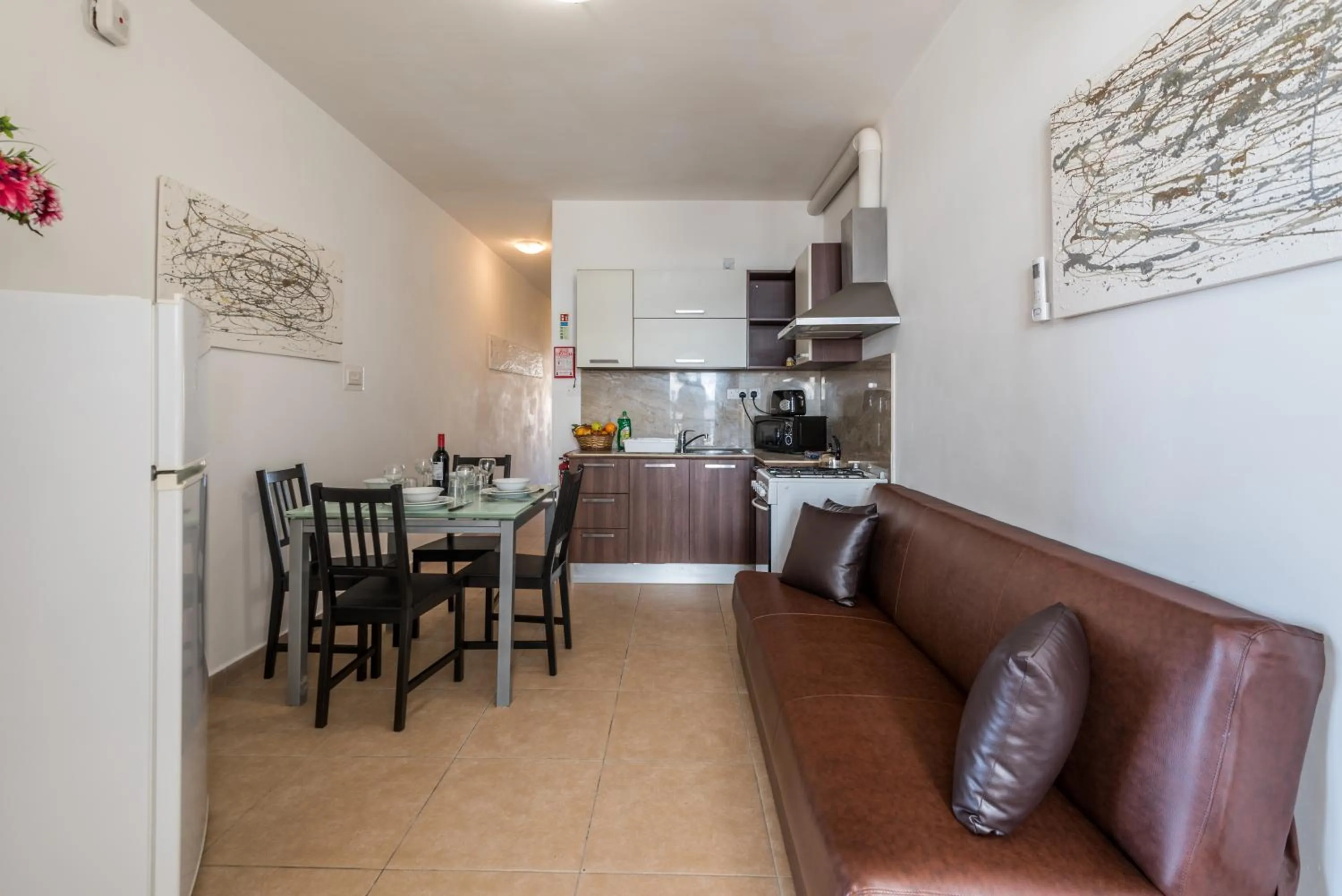 Kitchen or kitchenette in Seashells 2 bedroom Apartment with sunny terrace with stunning sea views - by Getawaysmalta