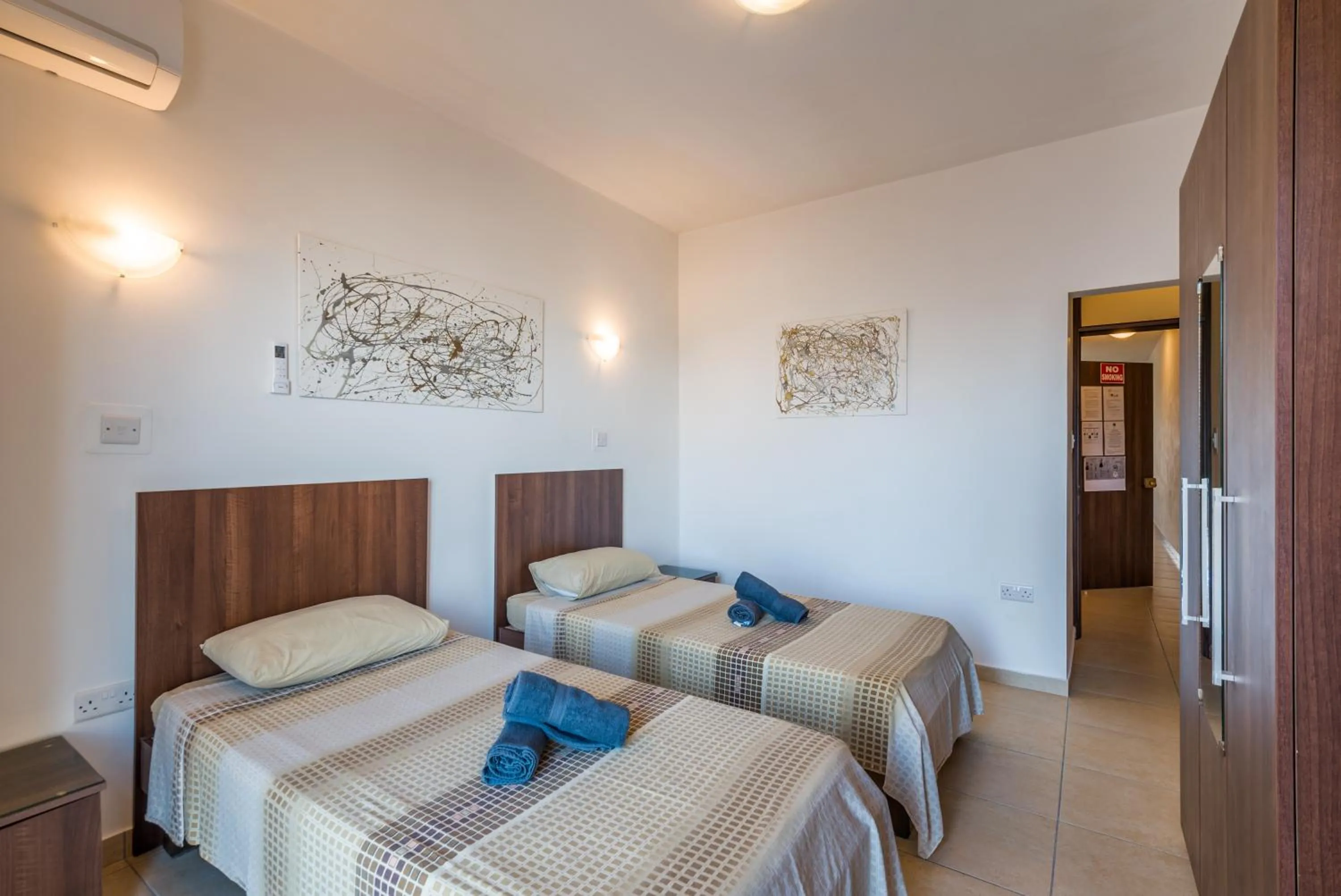 Bedroom, Bed in Seashells 2 bedroom Apartment with sunny terrace with stunning sea views - by Getawaysmalta