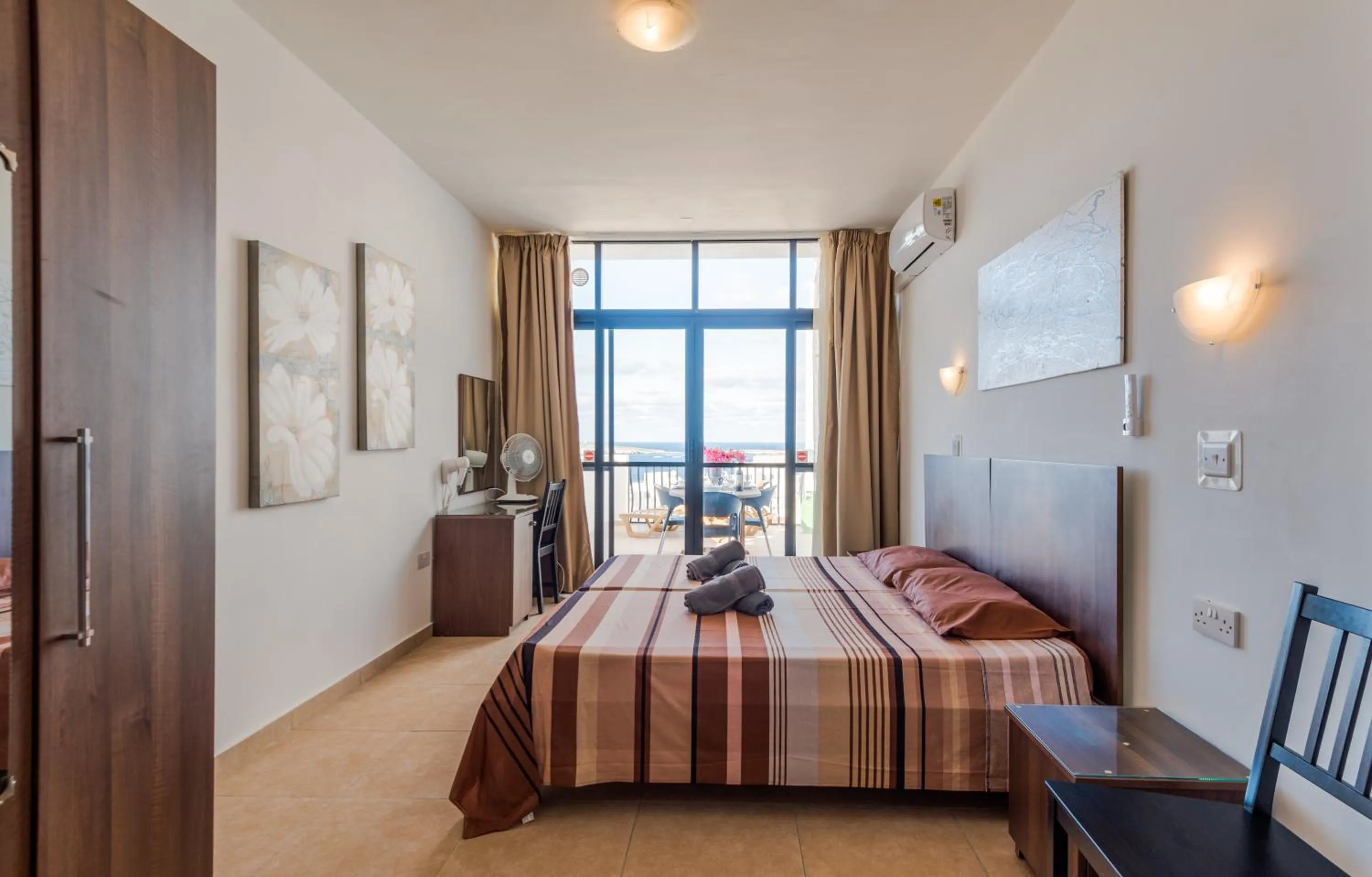 Bedroom, Bed in Seashells 2 bedroom Apartment with sunny terrace with stunning sea views - by Getawaysmalta