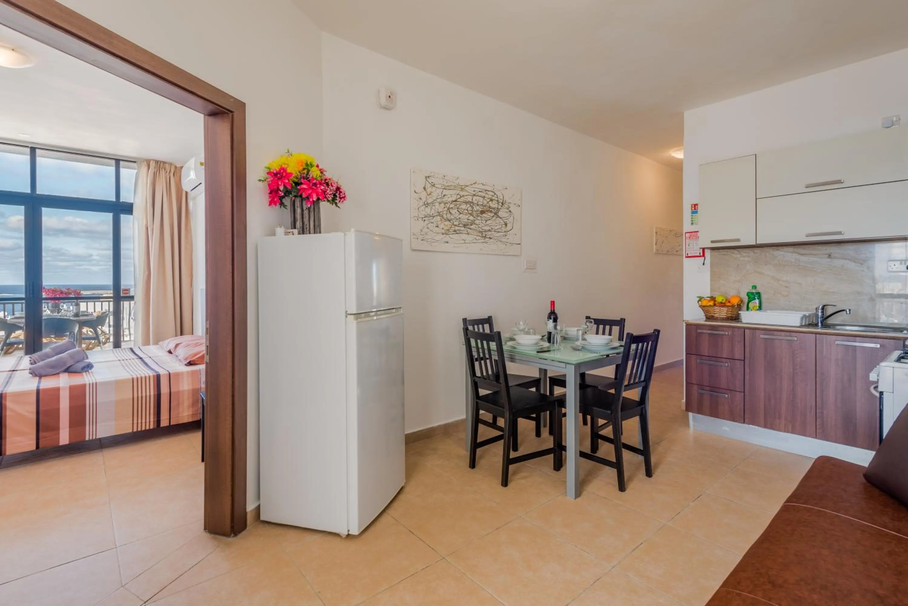 Kitchen or kitchenette, Bed in Seashells 2 bedroom Apartment with sunny terrace with stunning sea views - by Getawaysmalta