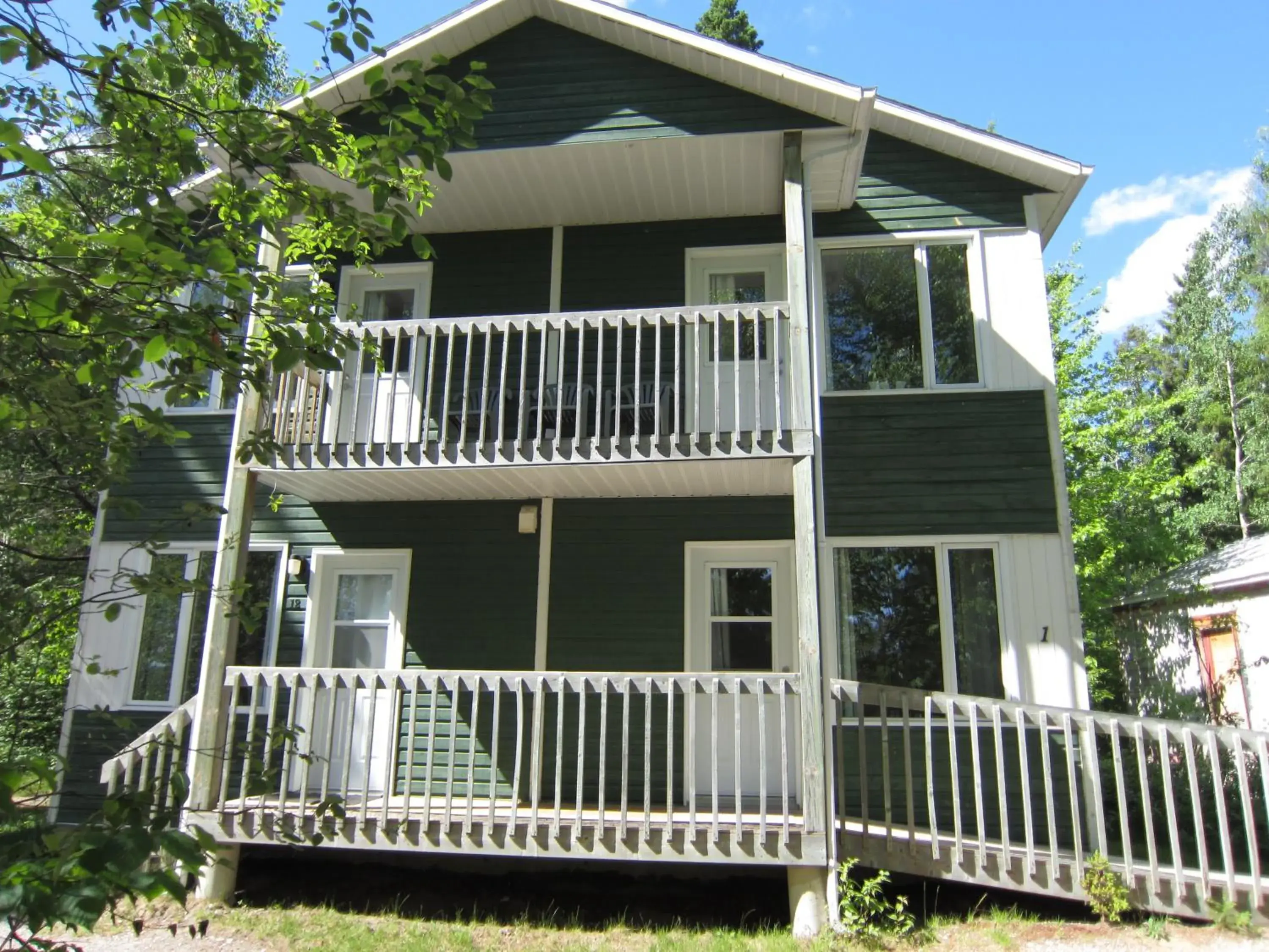 Triple Room with Private Bathroom in Auberge Île du Repos Triple Room with Private Bathroom in Auberge Île du Repos
