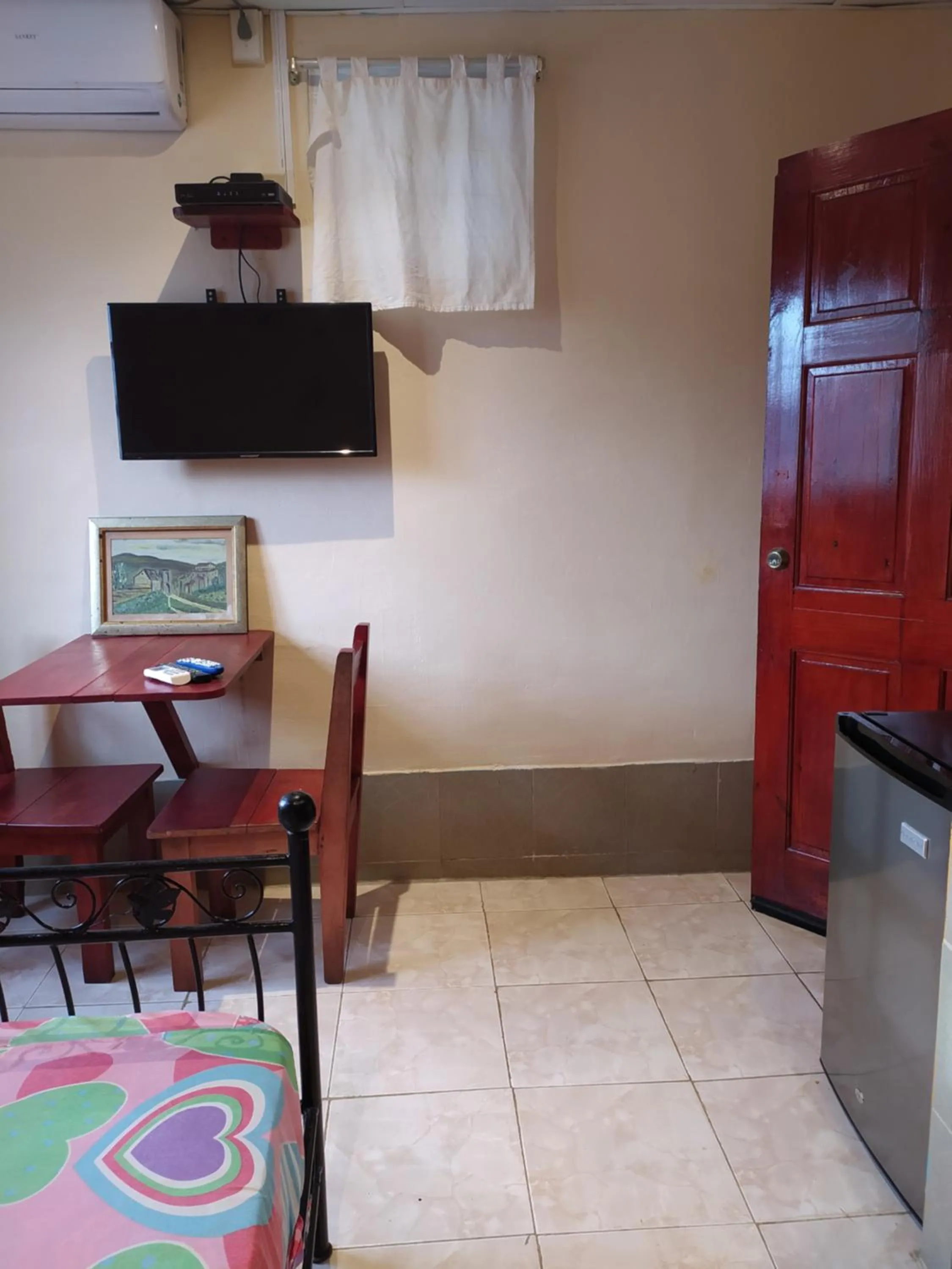 TV and multimedia in Sun Havens Apartments & Suites