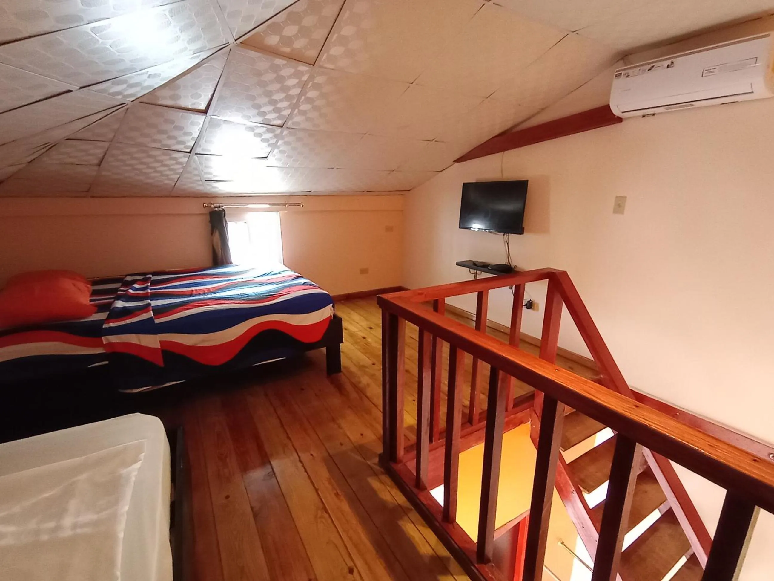 Bedroom, Bed in Sun Havens Apartments & Suites