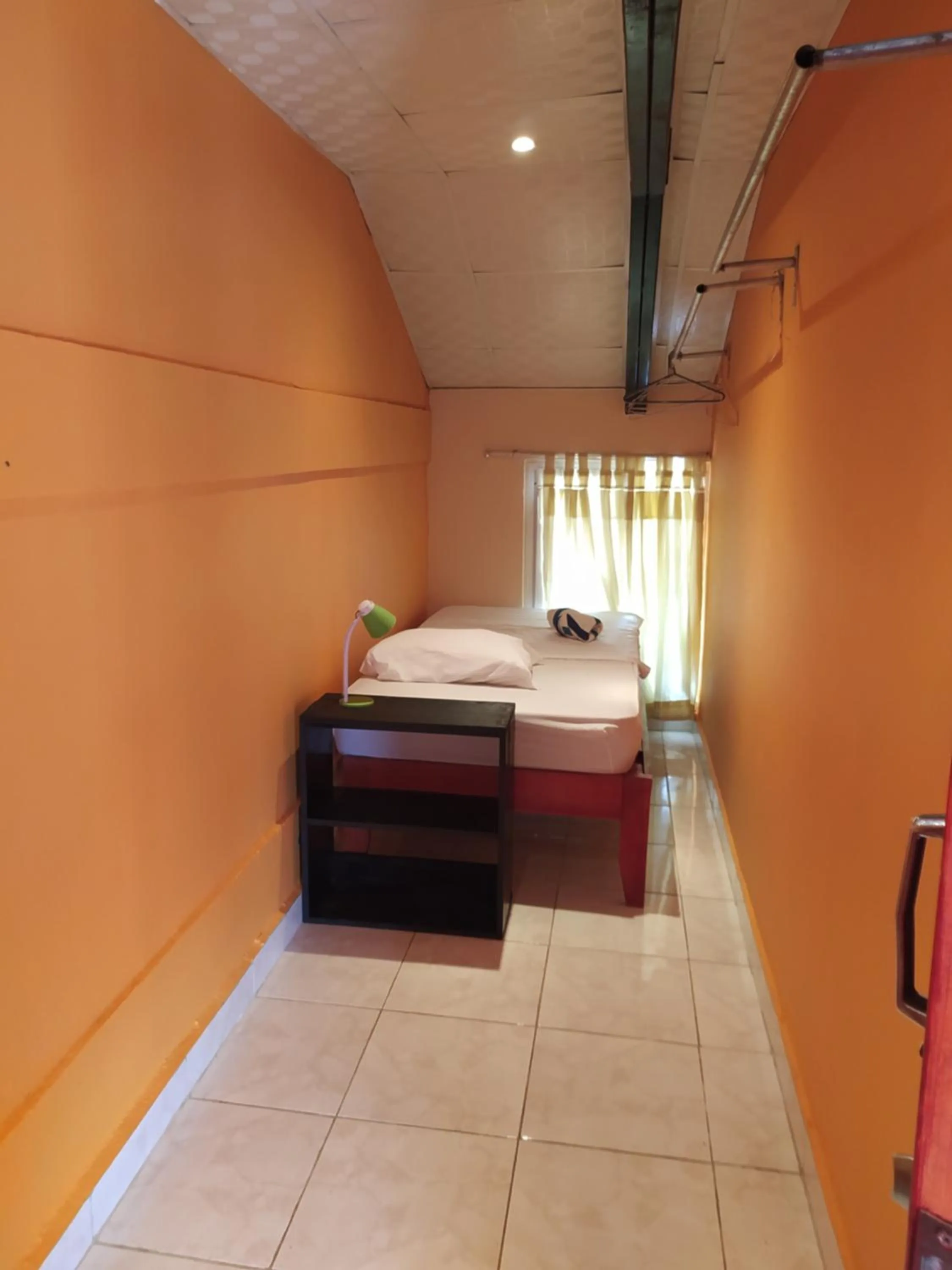 Bed in Sun Havens Apartments & Suites