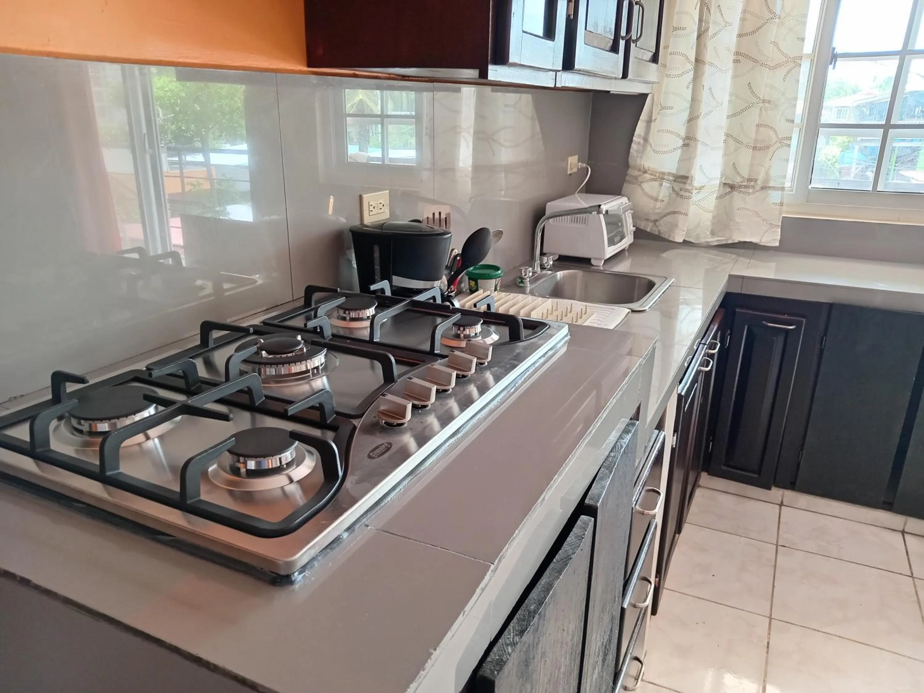 kitchen in Sun Havens Apartments & Suites