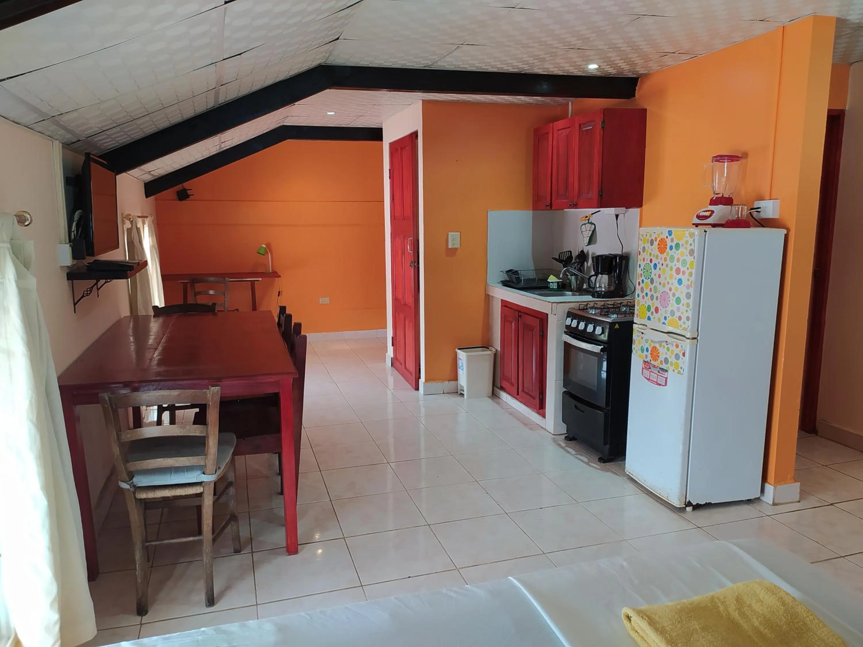 Kitchen or kitchenette in Sun Havens Apartments & Suites