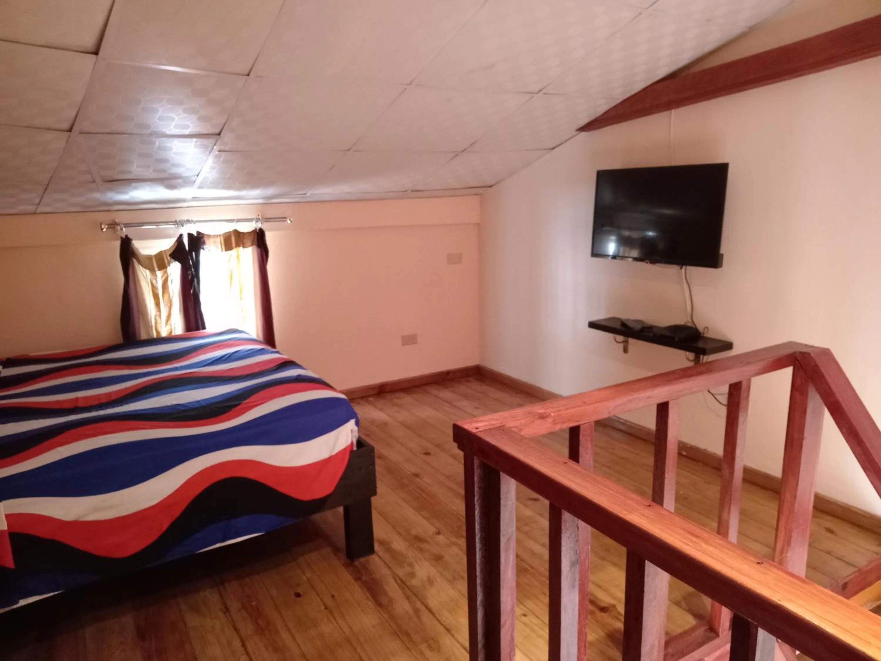 Bedroom, Bed in Sun Havens Apartments & Suites