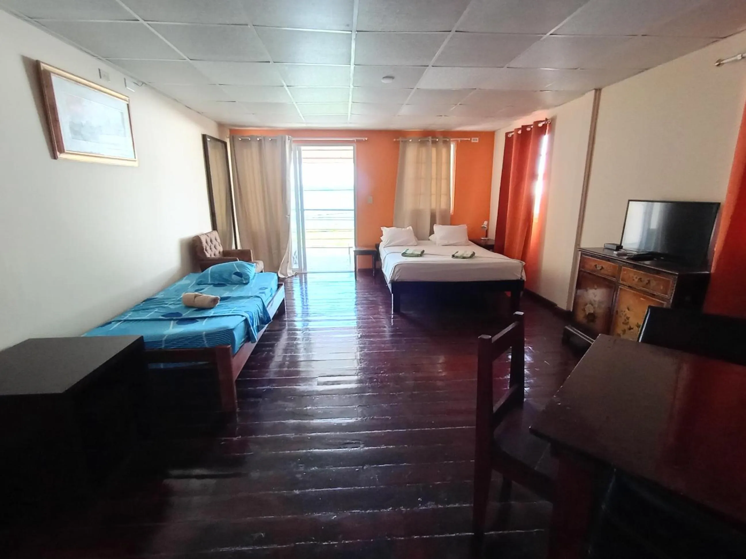 Bedroom, Bed in Sun Havens Apartments & Suites