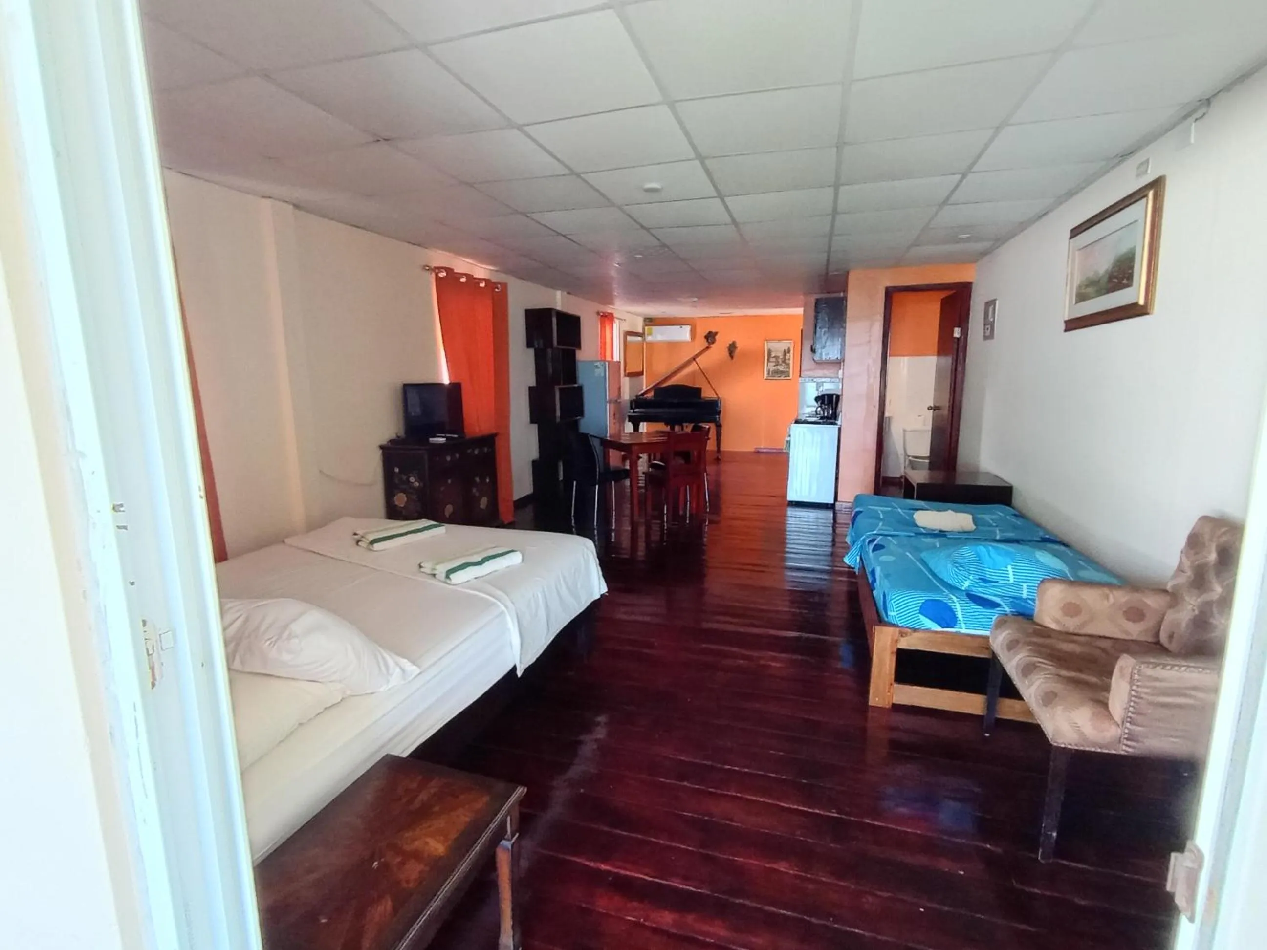 Bedroom, Bed in Sun Havens Apartments & Suites