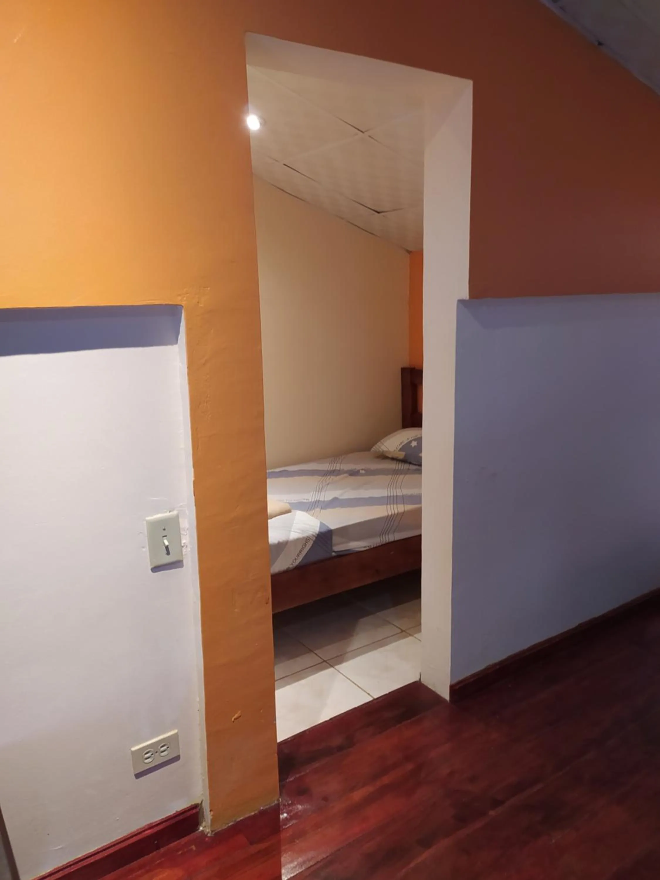 Bed in Sun Havens Apartments & Suites