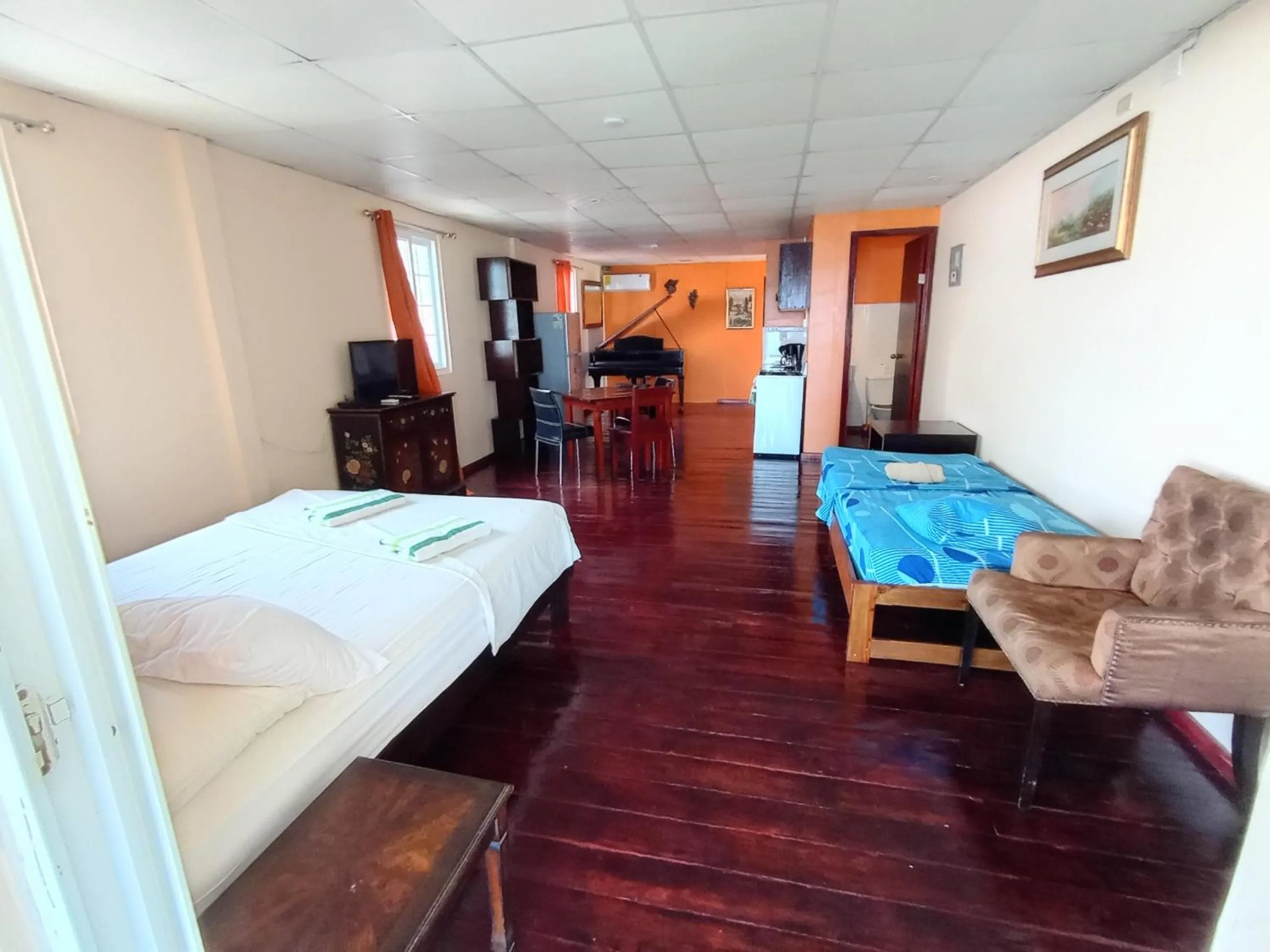 Bedroom, Bed in Sun Havens Apartments & Suites