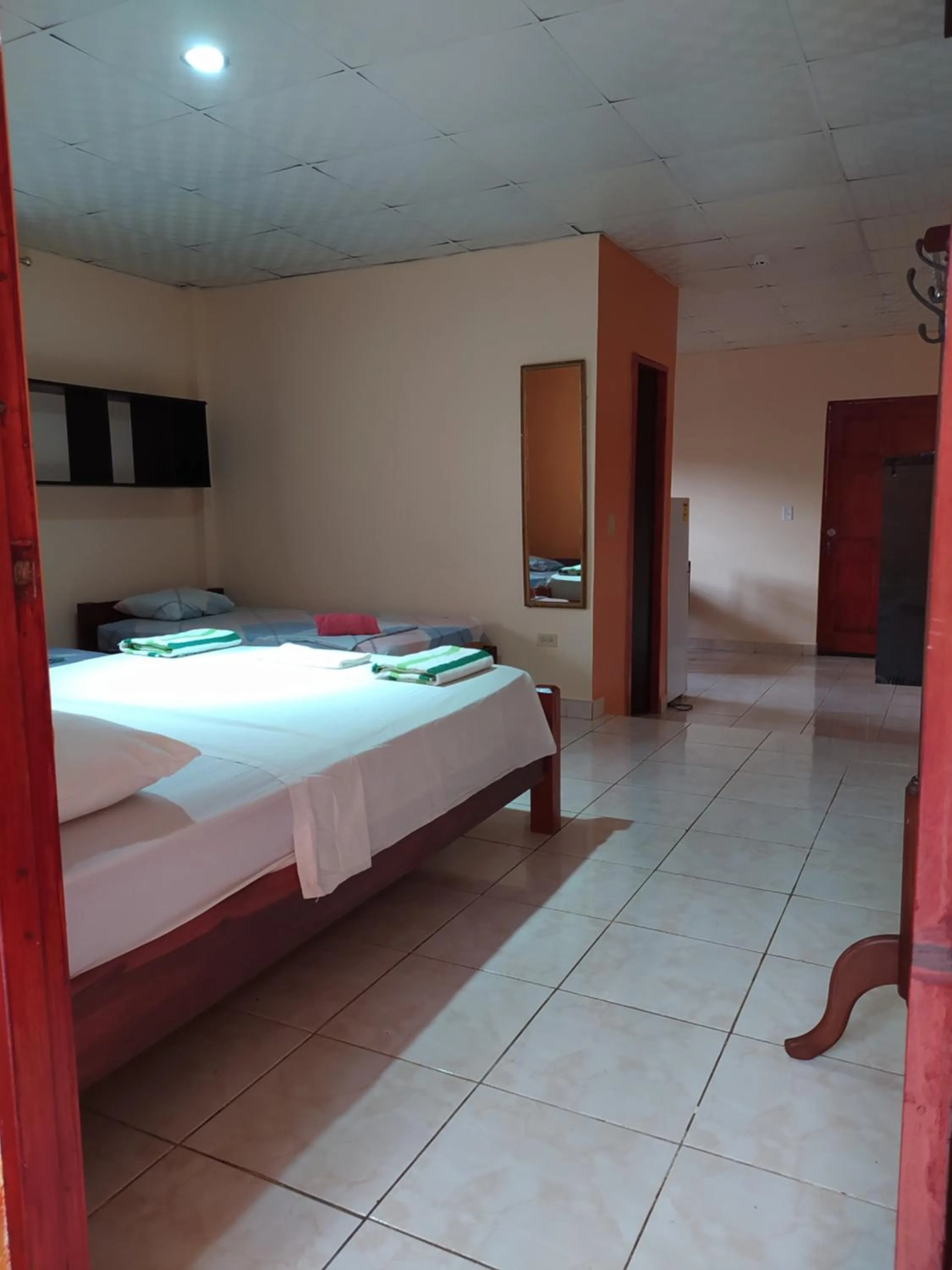 Bed in Sun Havens Apartments & Suites