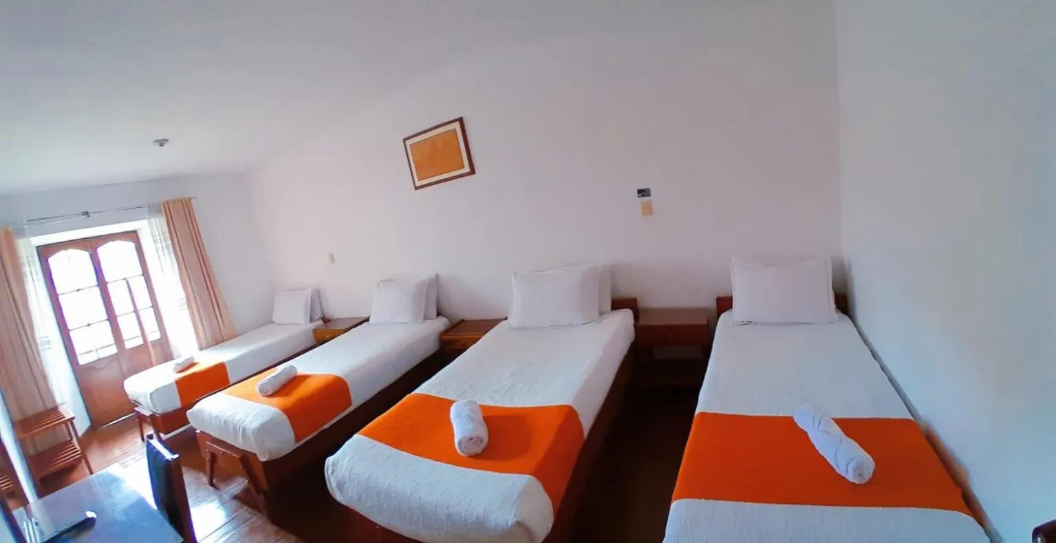 Bed in Hotel El Cid Plaza Premium