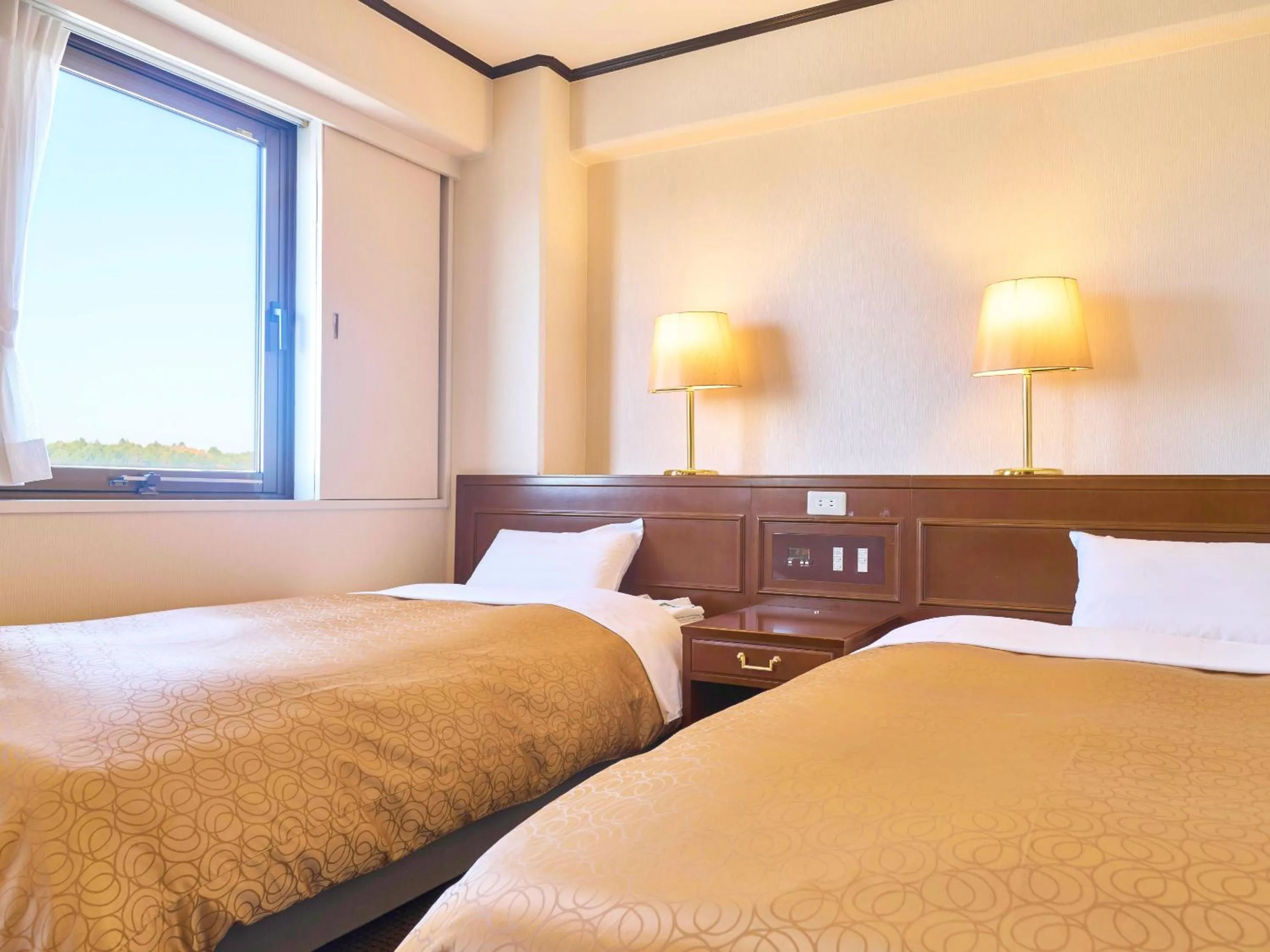 Bed in Minakuchi Century Hotel