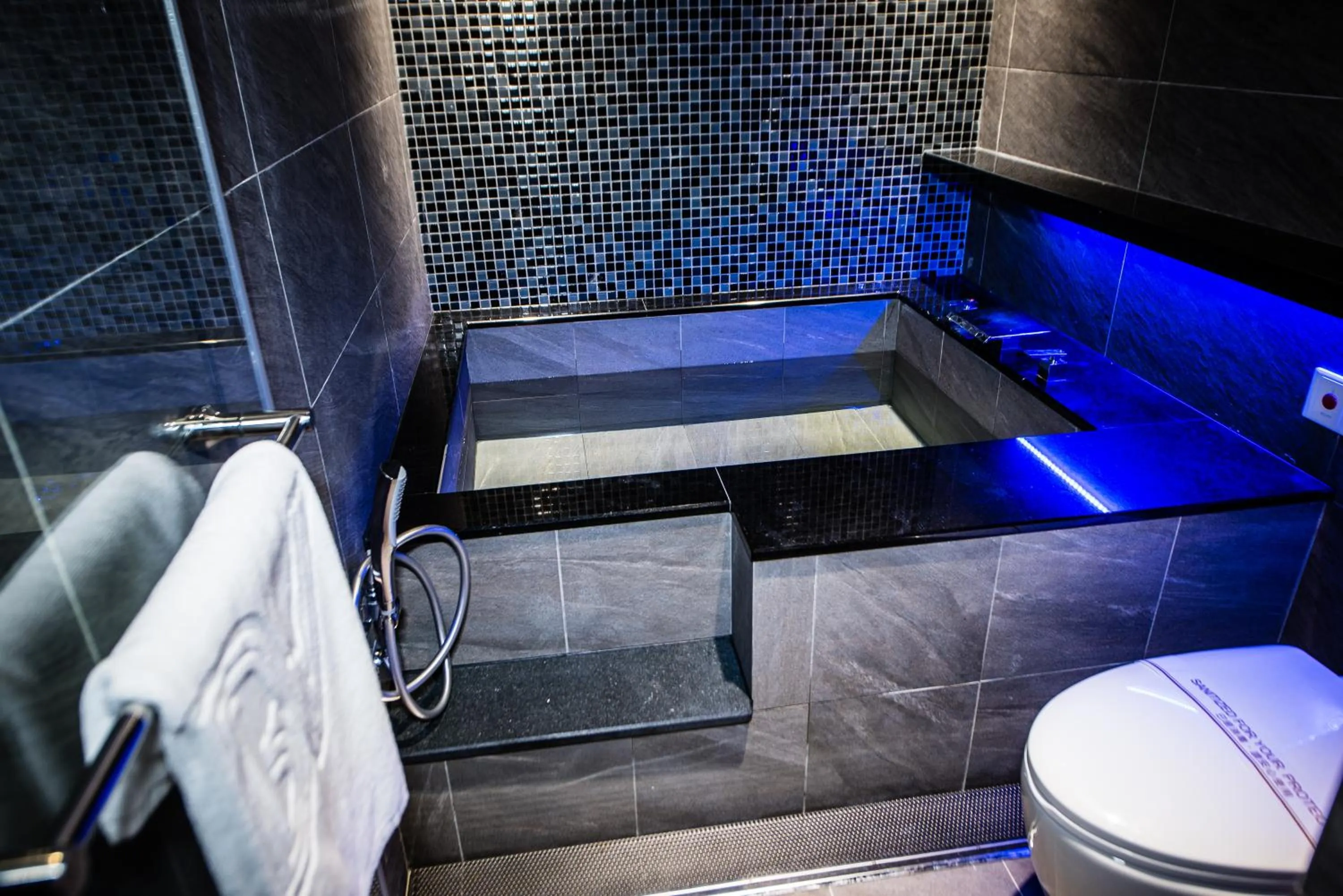 Shower in SIX FUKUN HOTEL