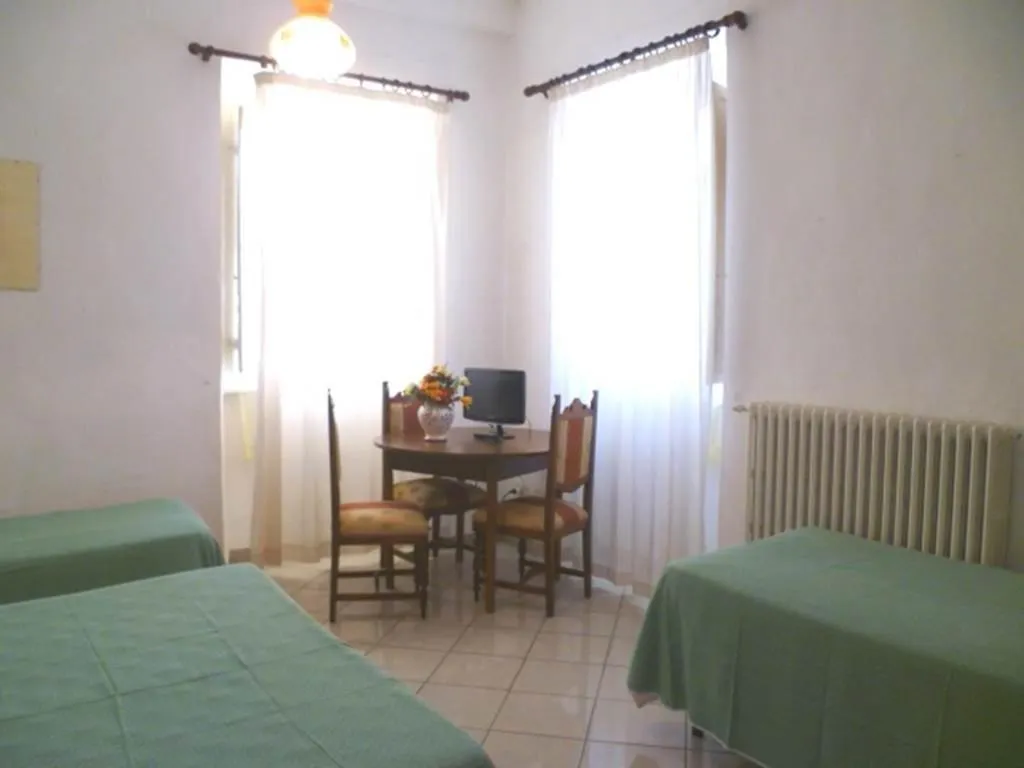 Bed in Albergo Ape Elbana