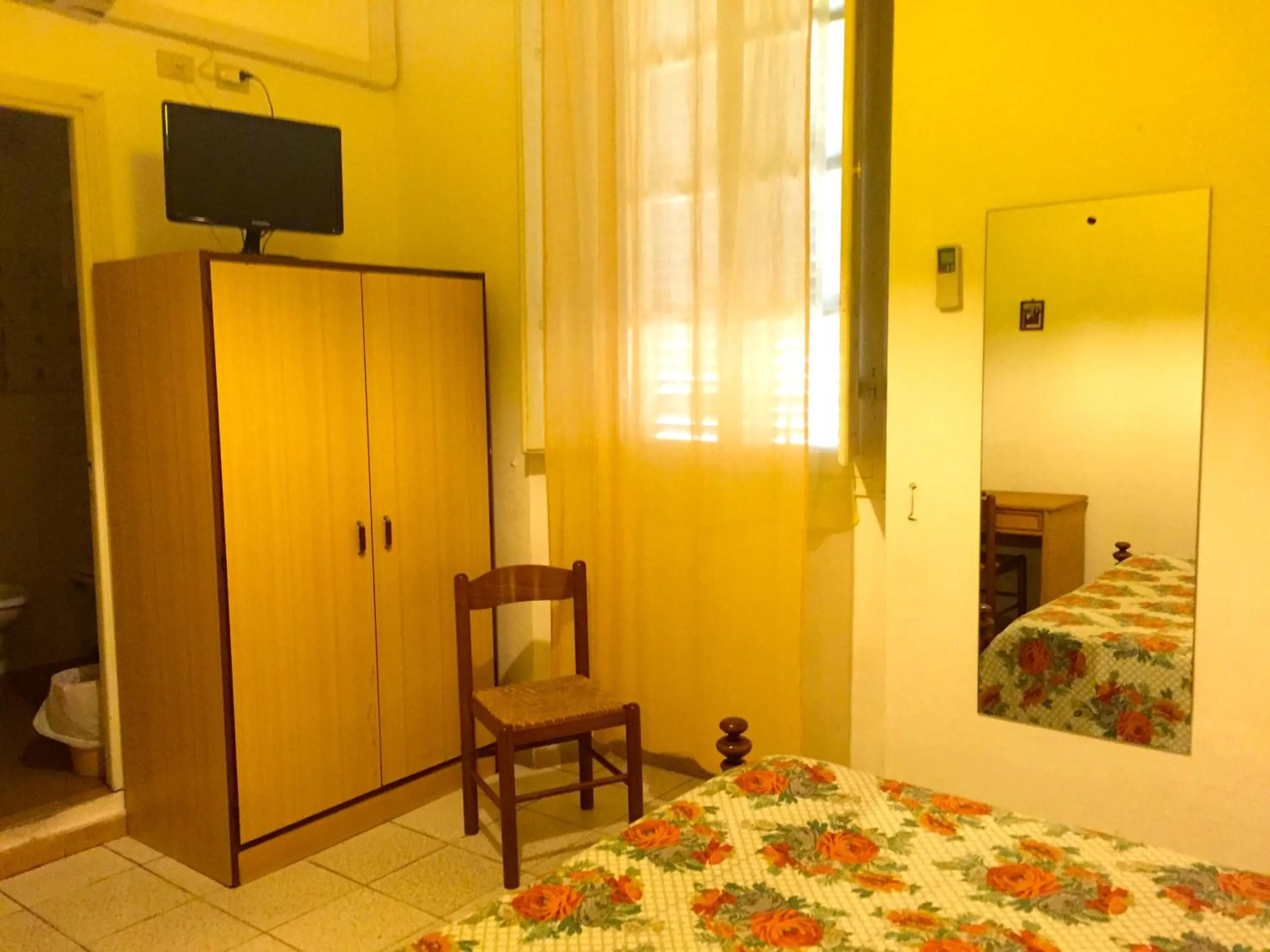 Bed in Albergo Ape Elbana