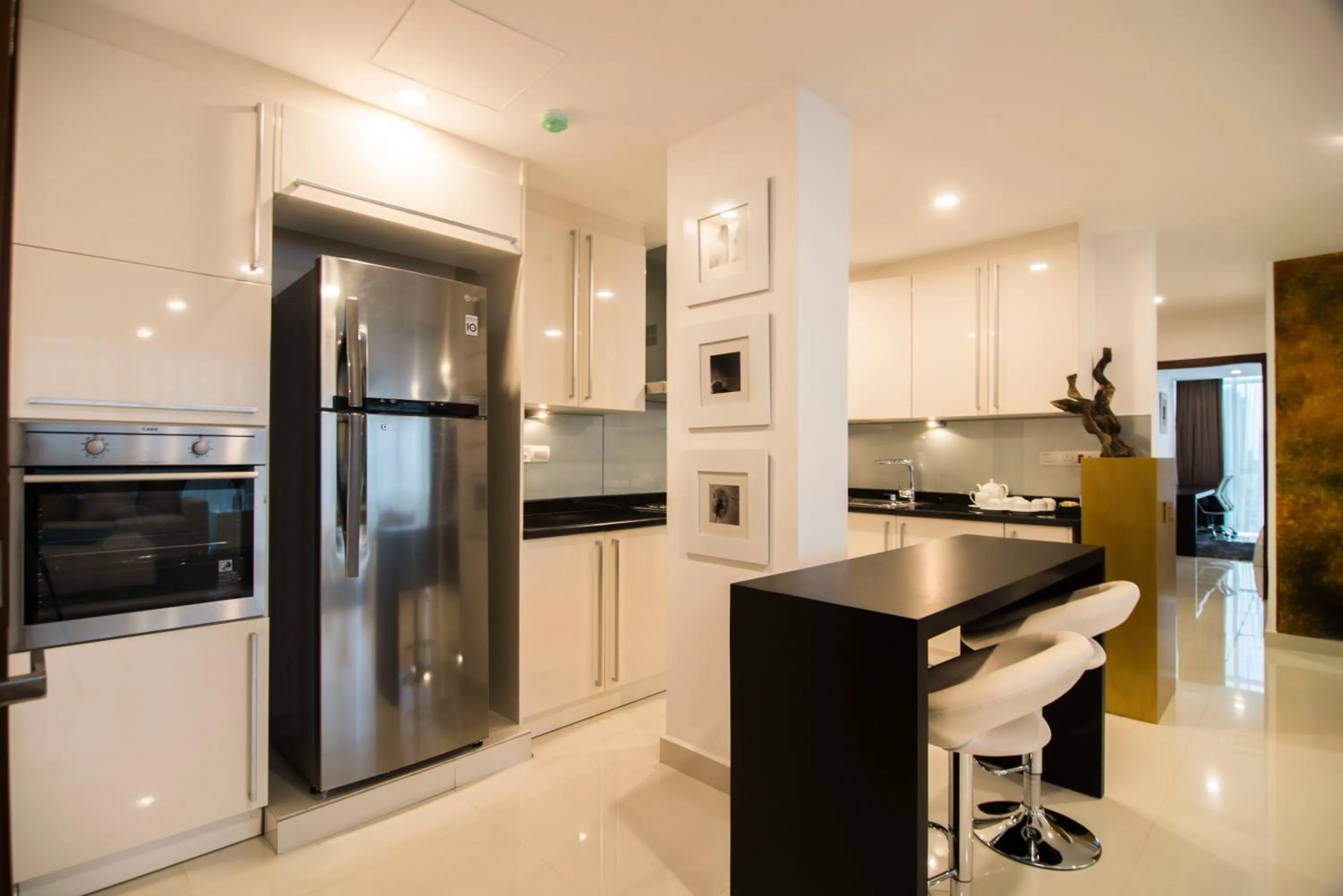 Kitchen or kitchenette in Platinum One Suites