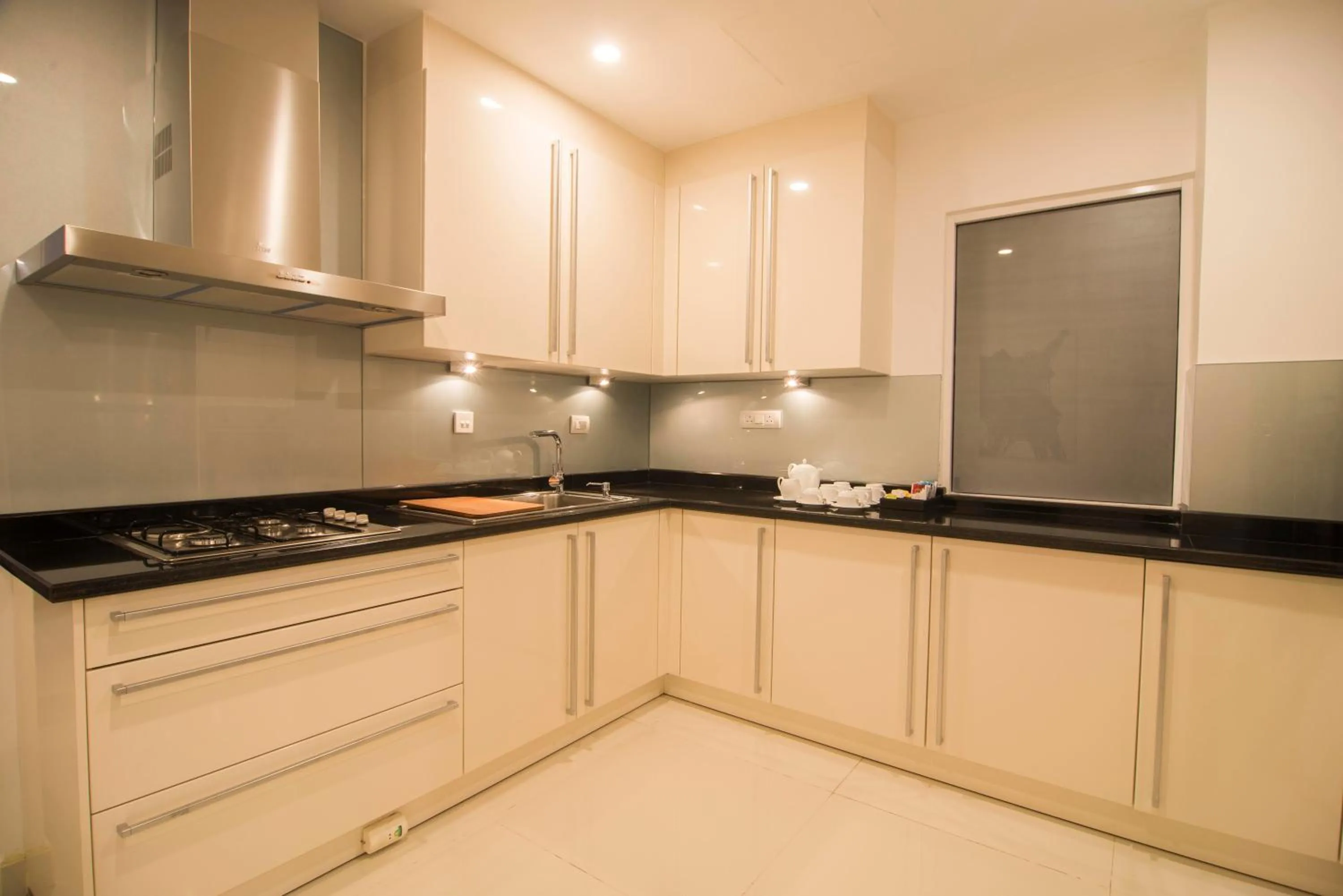 Kitchen or kitchenette in Platinum One Suites