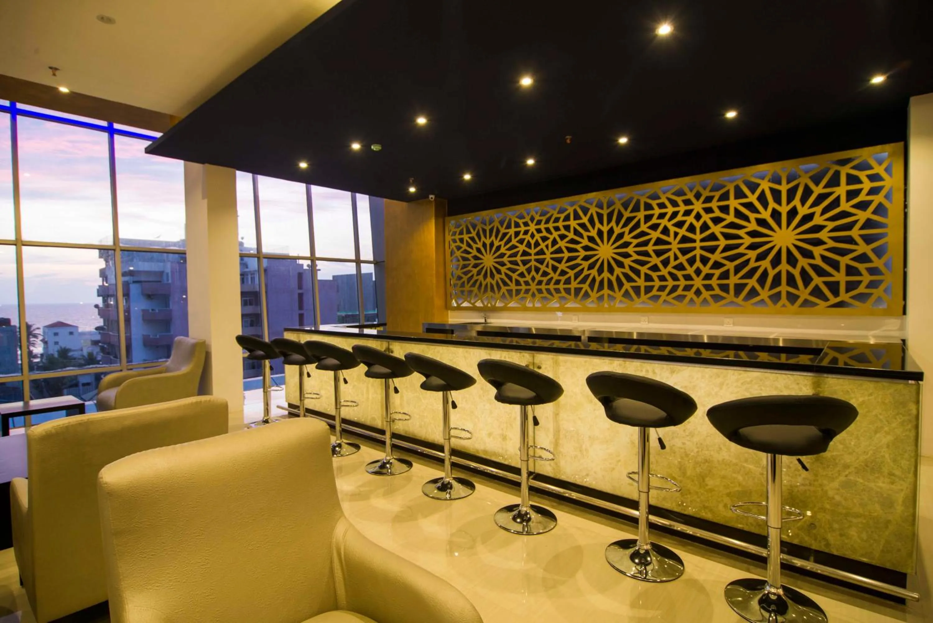 Lounge or bar in Platinum One Suites