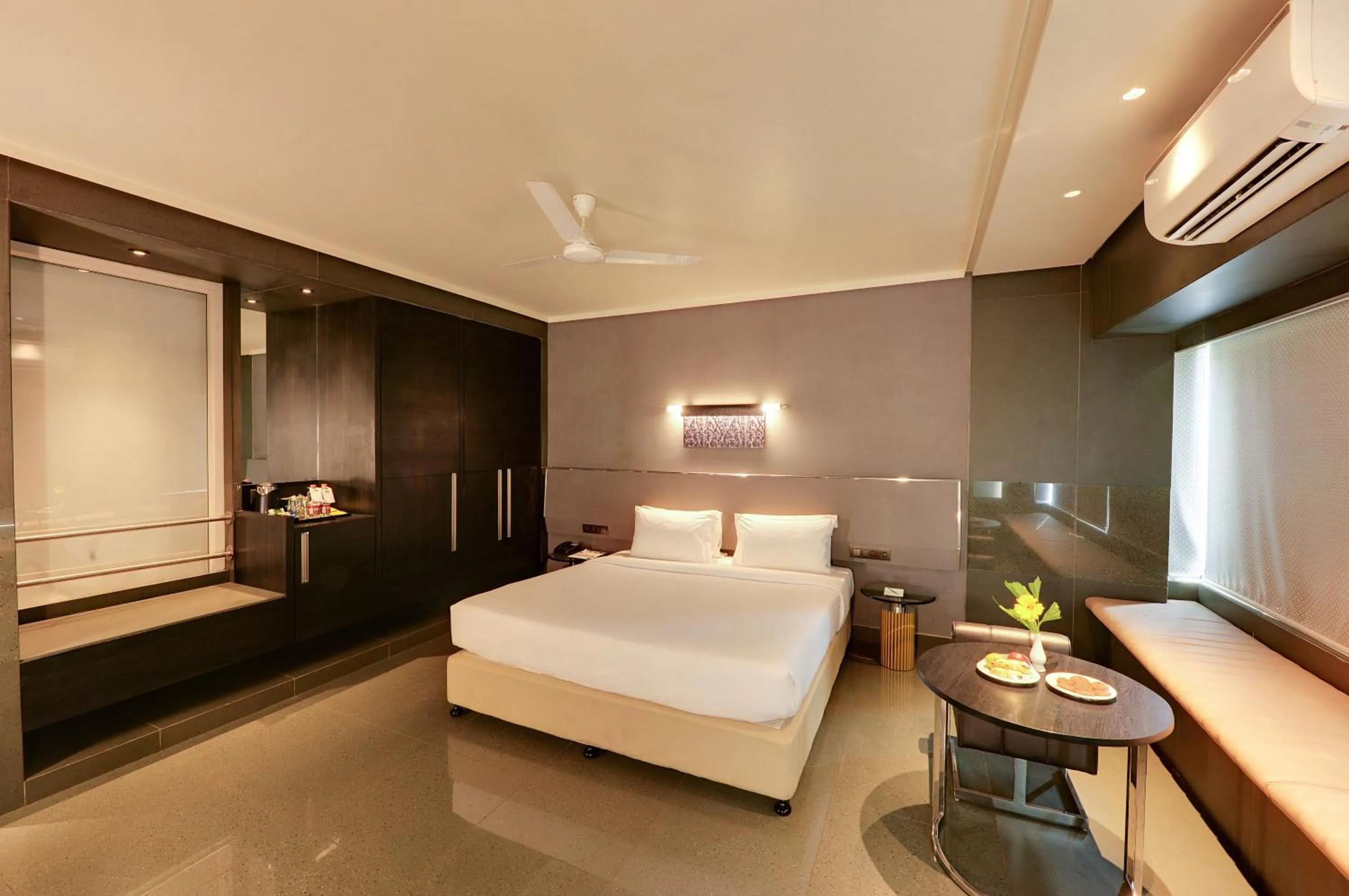 Seating area, Bed in Hotel Sankam Residency