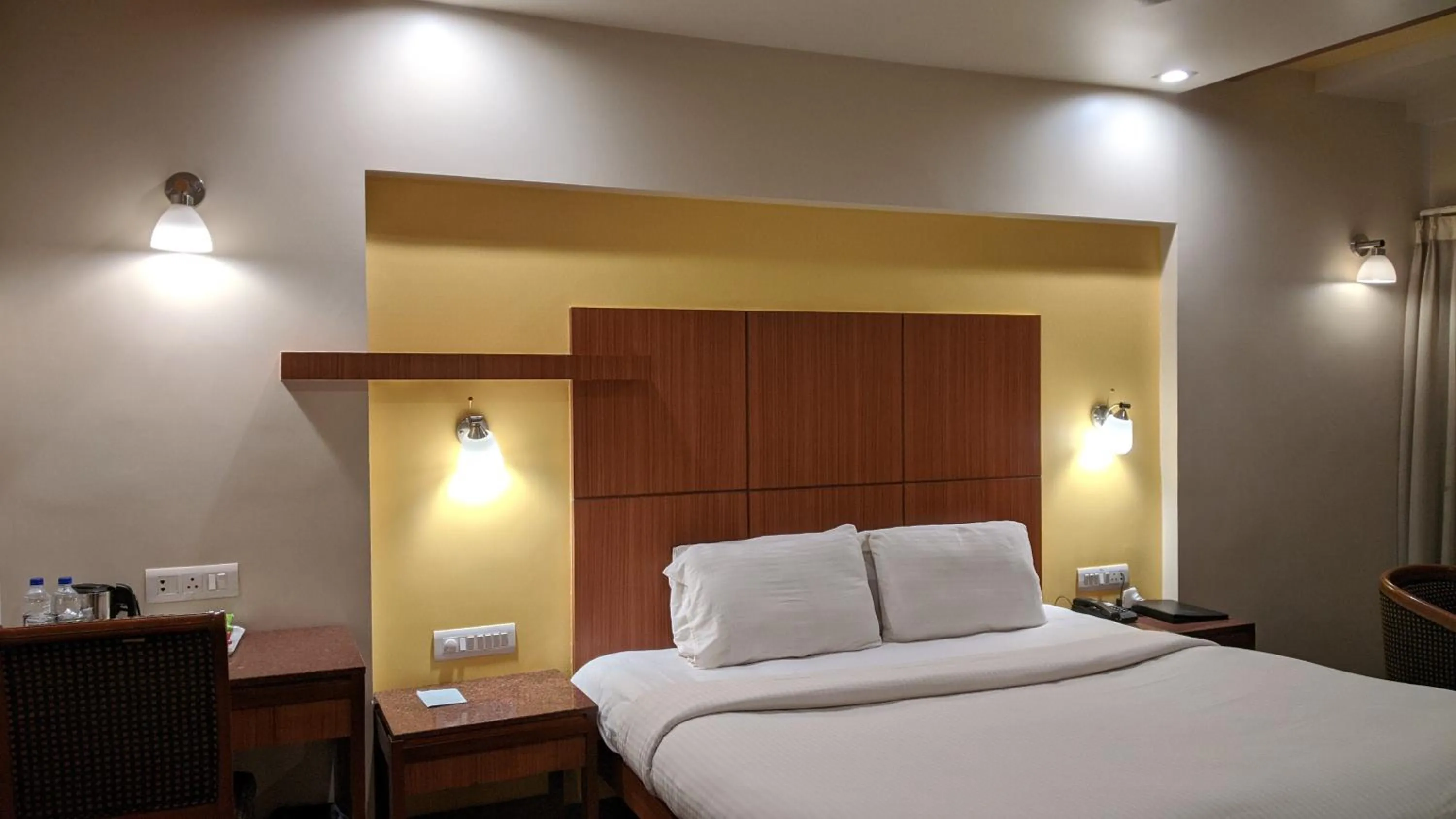 Bed in Hotel Sankam Residency
