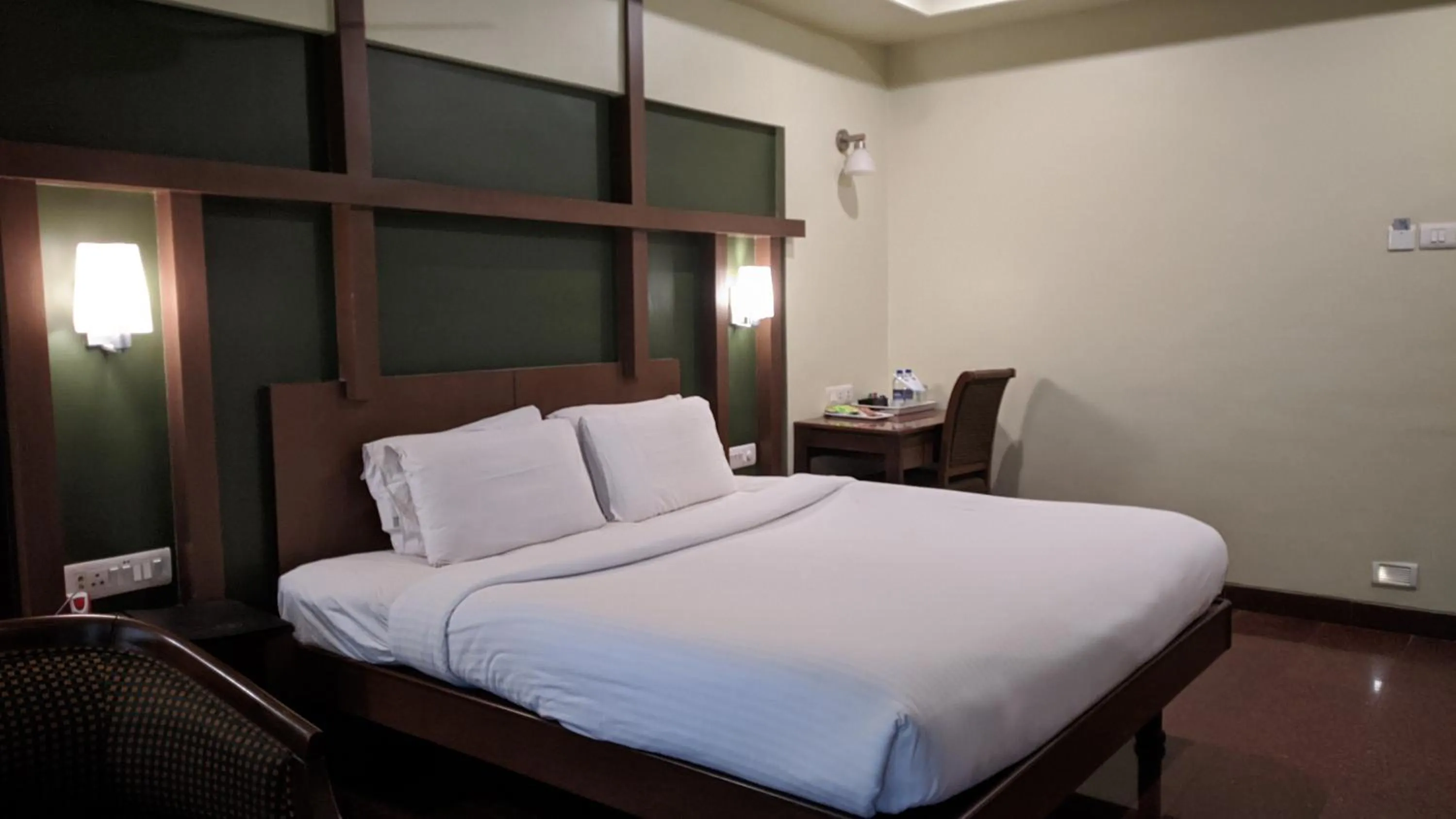 Bed in Hotel Sankam Residency