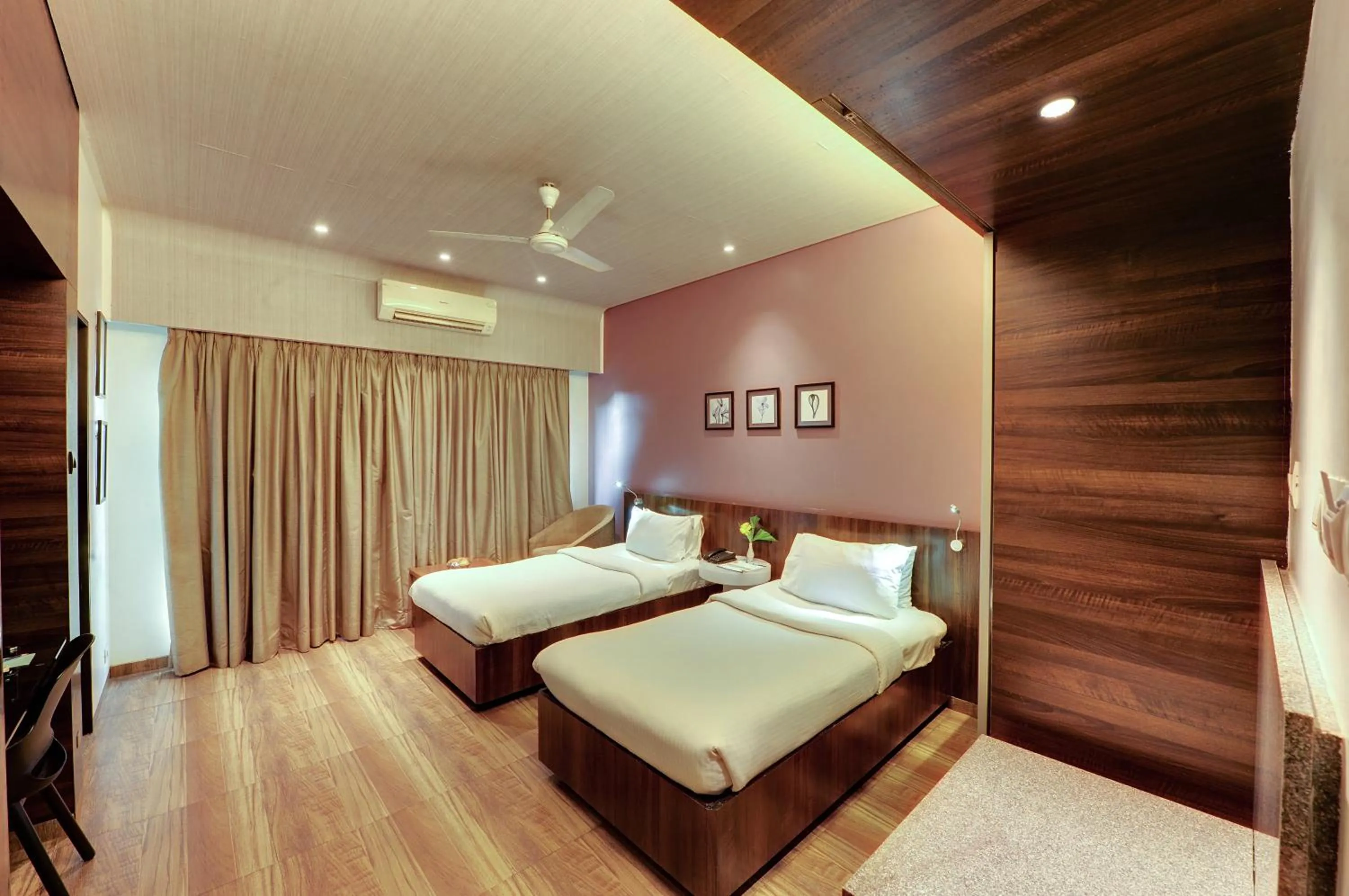 Bed in Hotel Sankam Residency