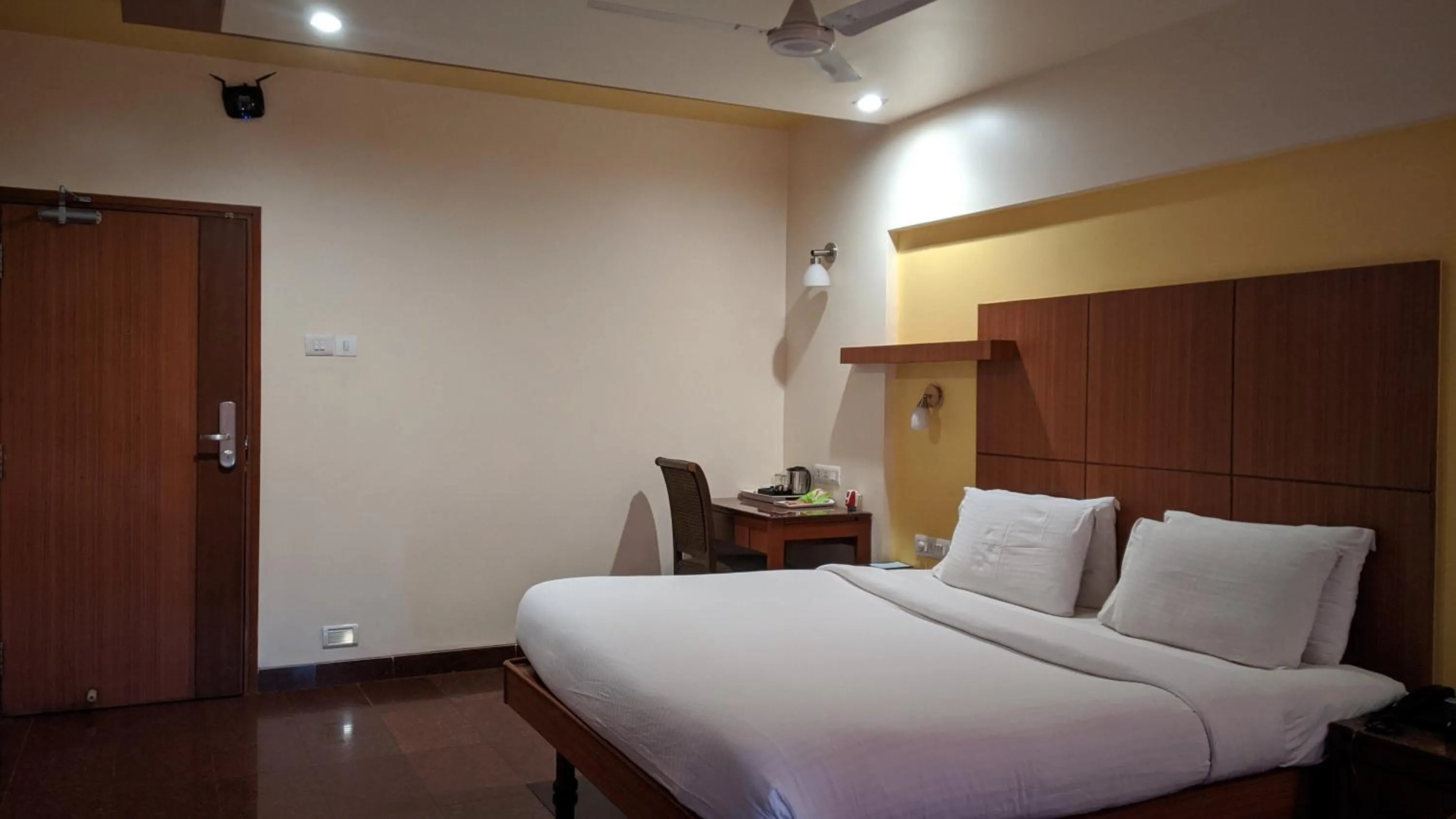Bed in Hotel Sankam Residency