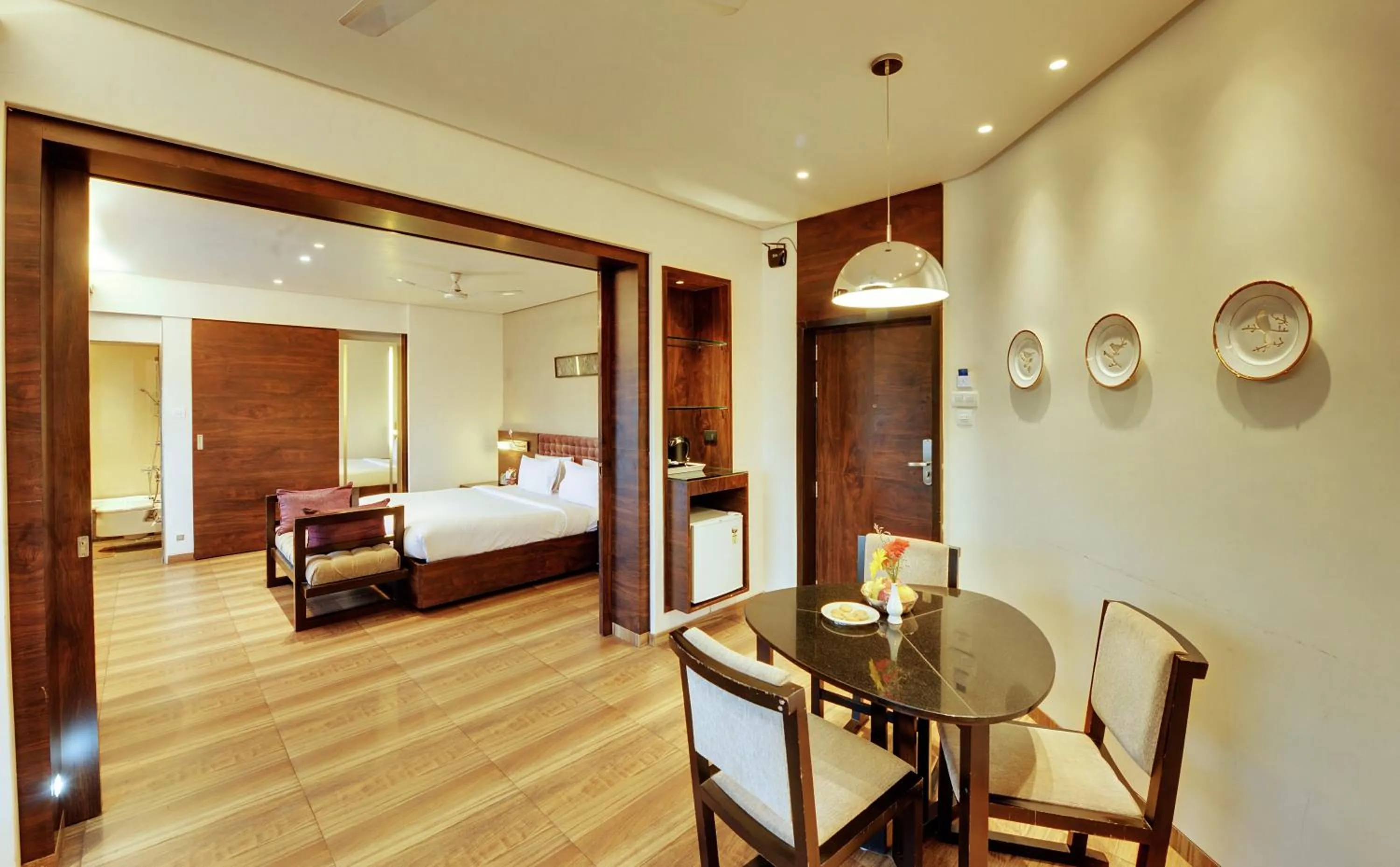 Dining area, Bed in Hotel Sankam Residency