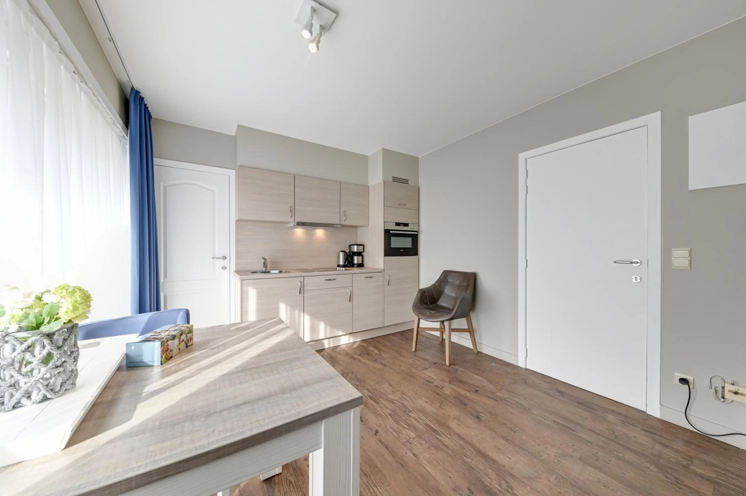 Kitchen or kitchenette in Holiday Suites De Haan