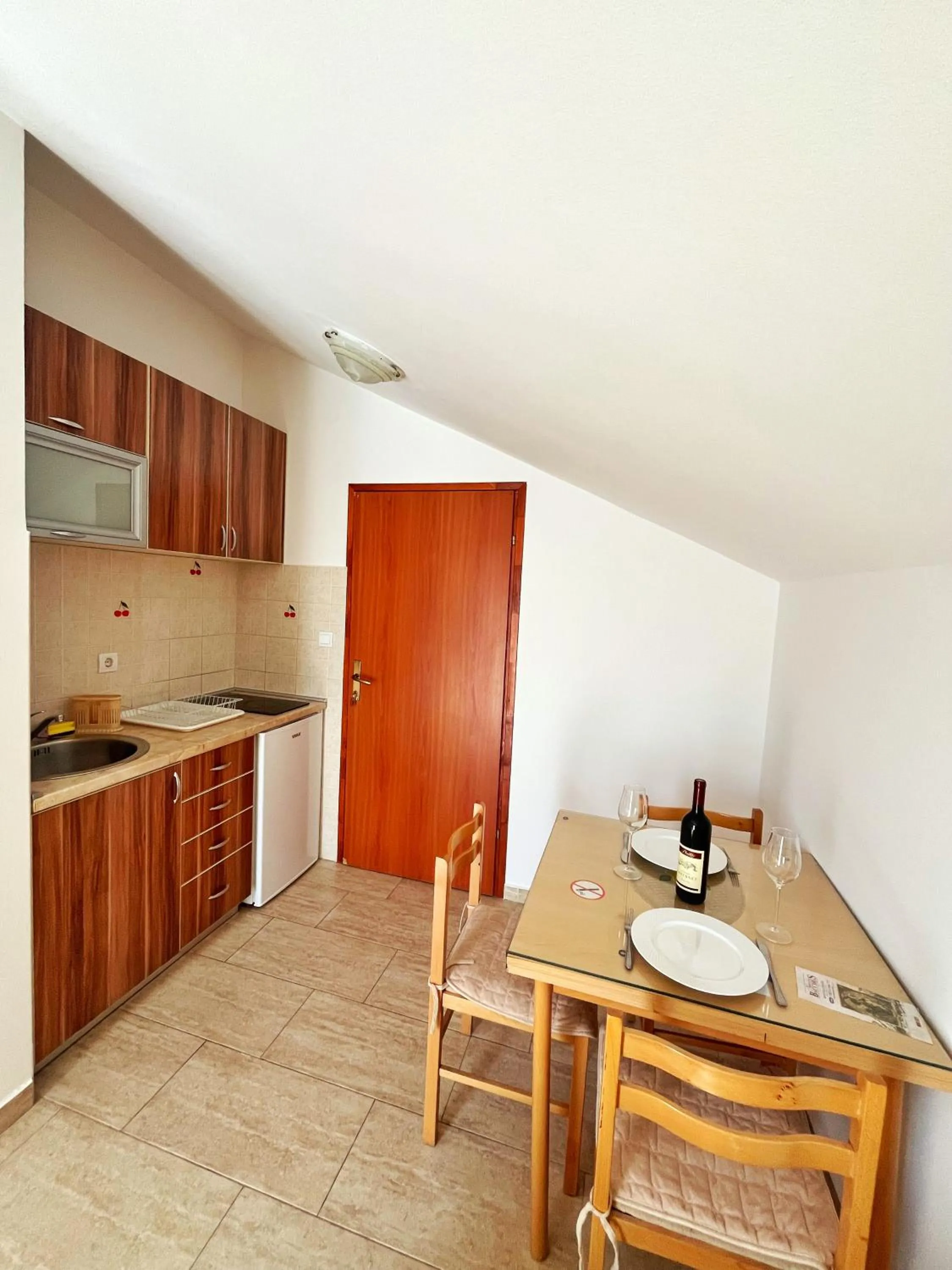 Kitchen or kitchenette in Apartments Dosljak