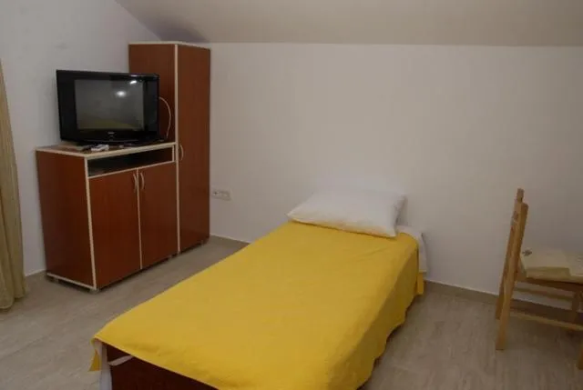 Bed in Apartments Dosljak