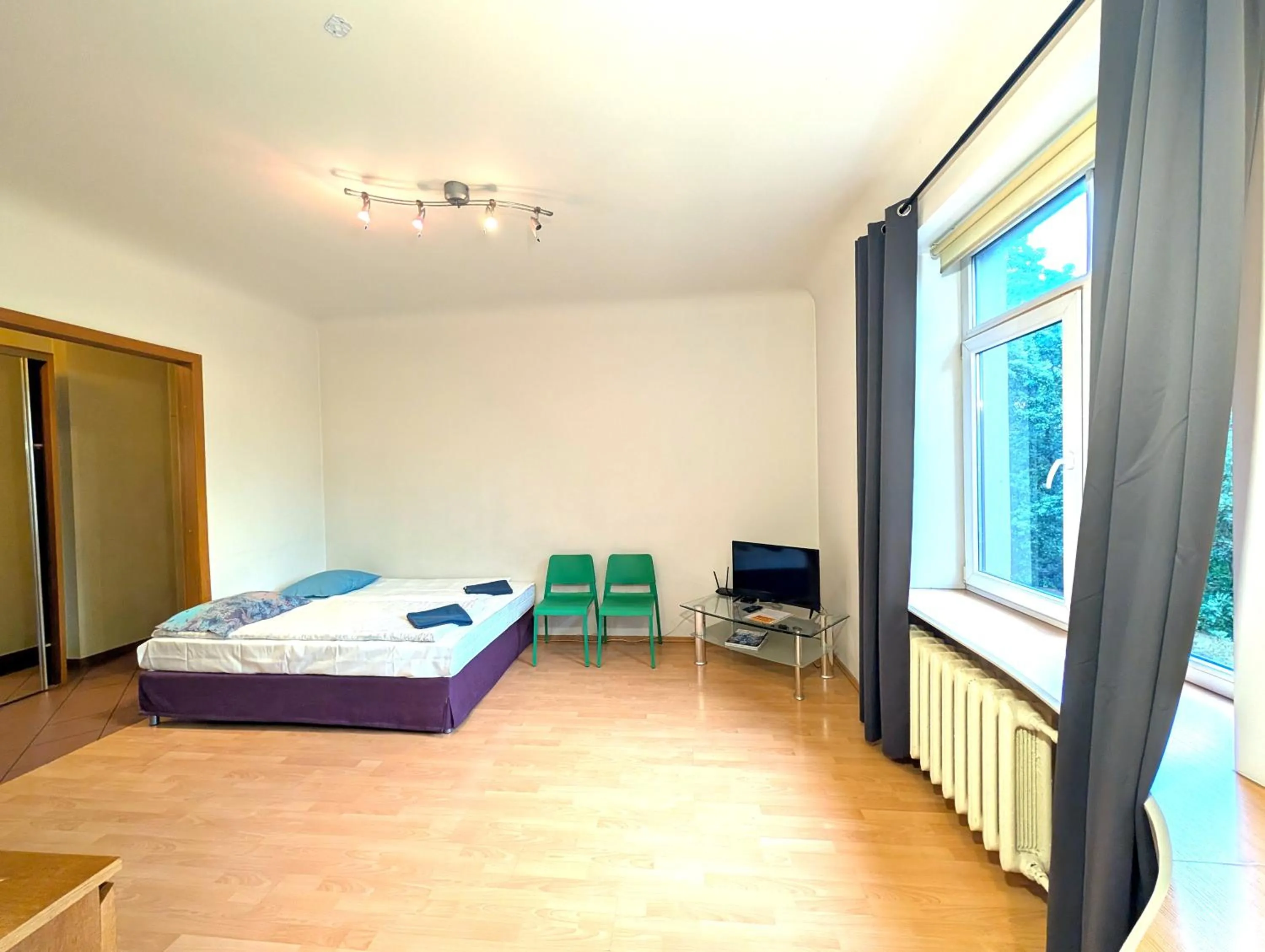 Bed in Heart of Old-Town Apartments