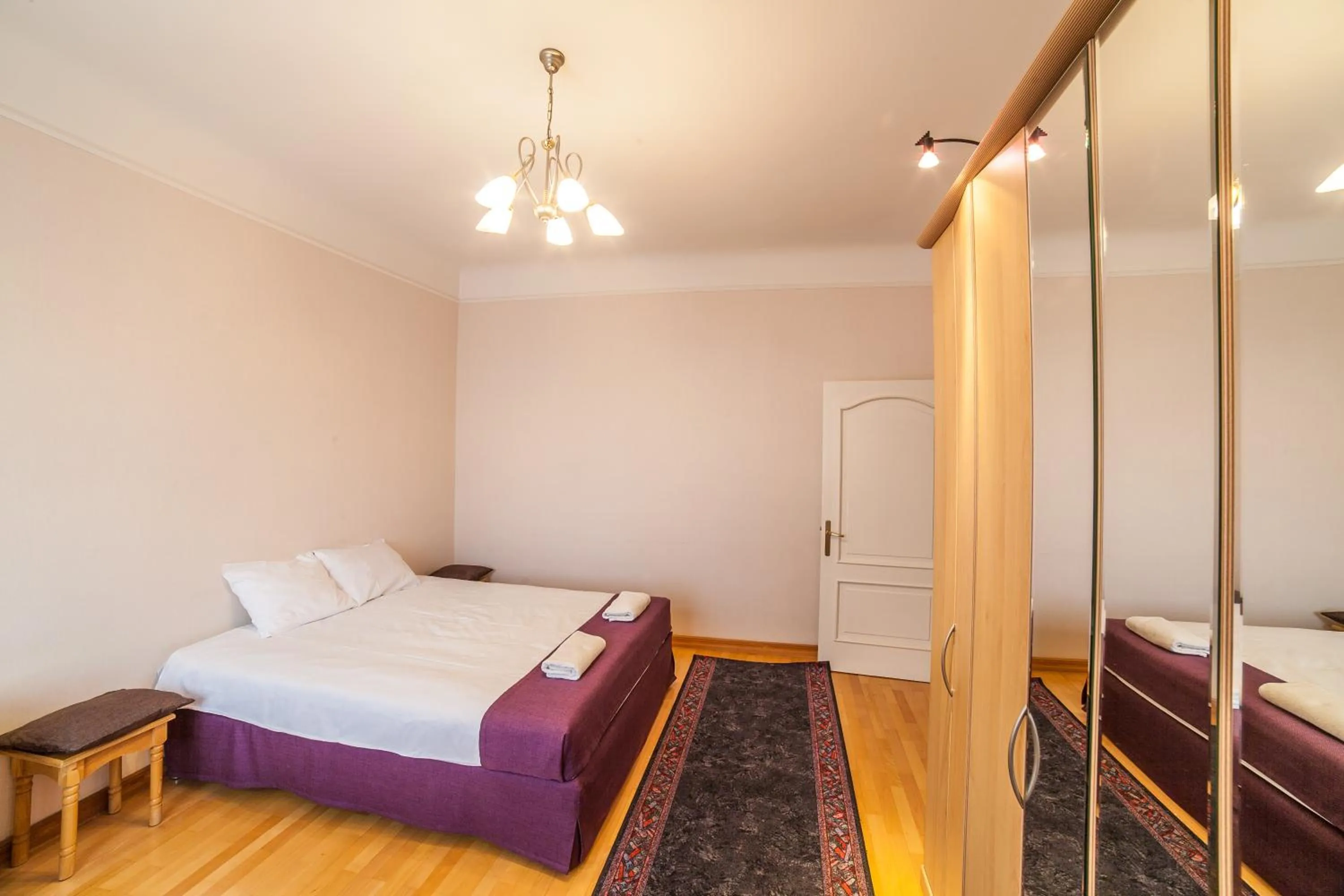Bed in Heart of Old-Town Apartments
