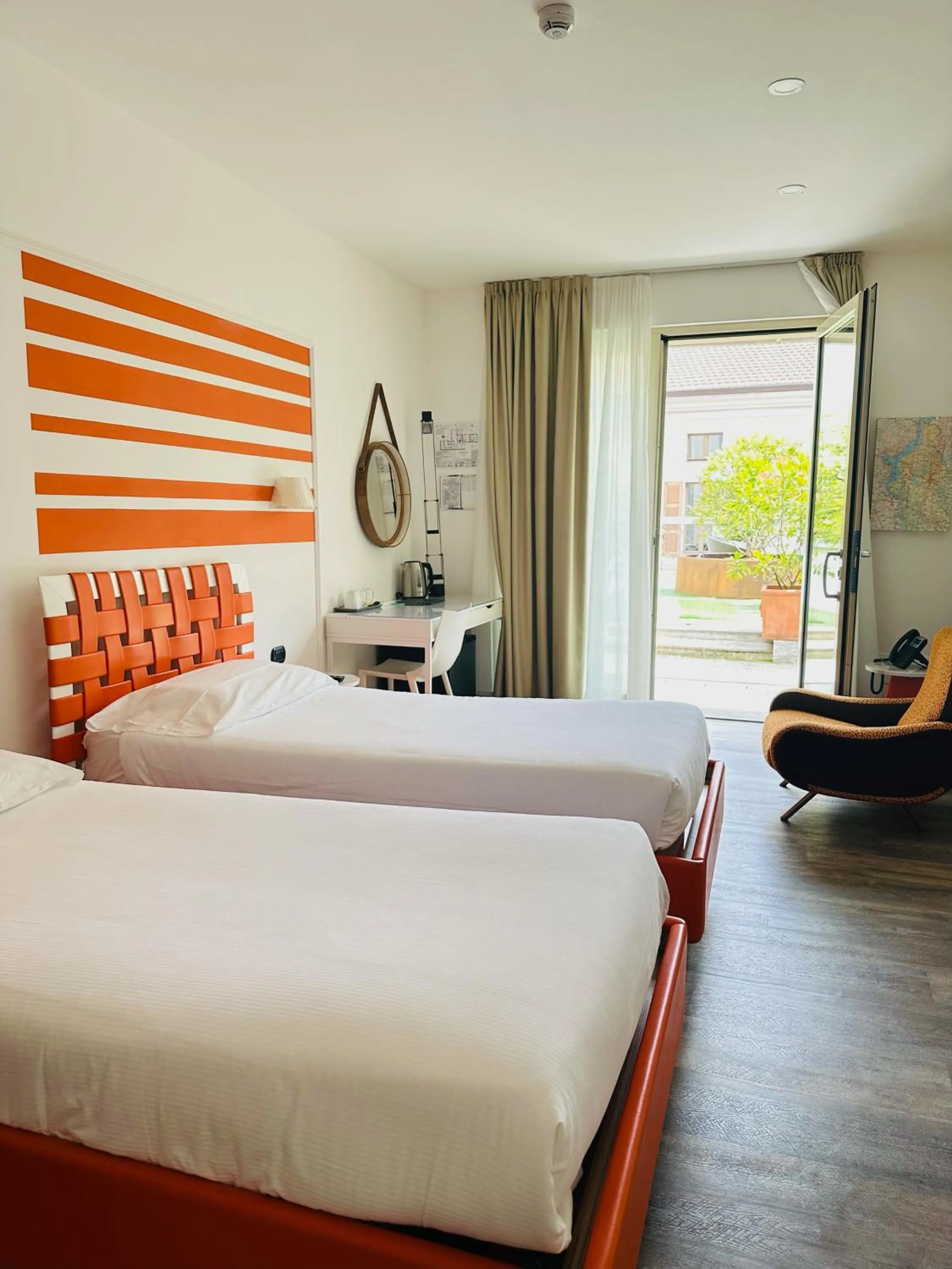 Photo of the whole room, Bed in Hotel Al Campanile - Luxury Suites & Apartments