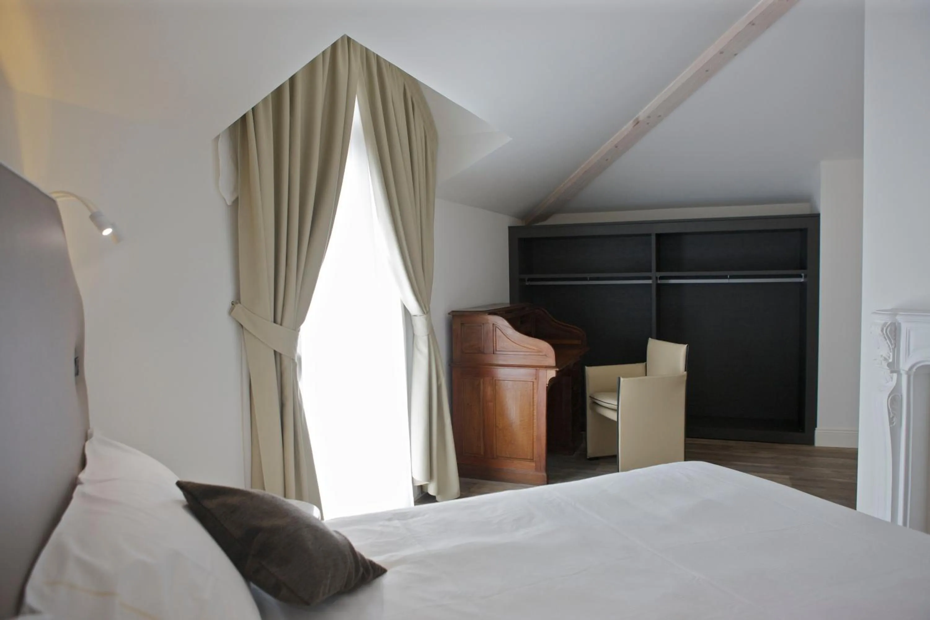 Decorative detail, Bed in Hotel Al Campanile - Luxury Suites & Apartments