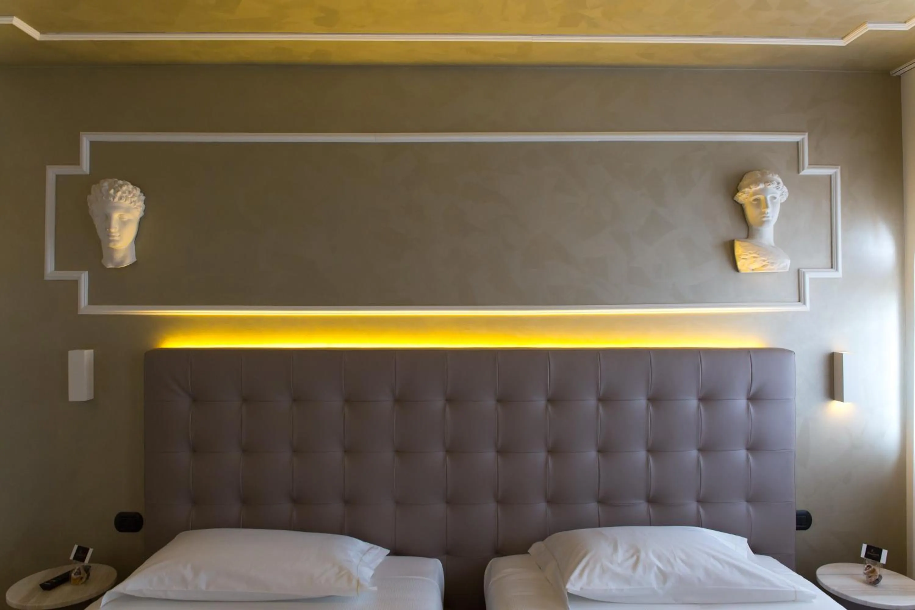 Decorative detail, Bed in Hotel Al Campanile - Luxury Suites & Apartments
