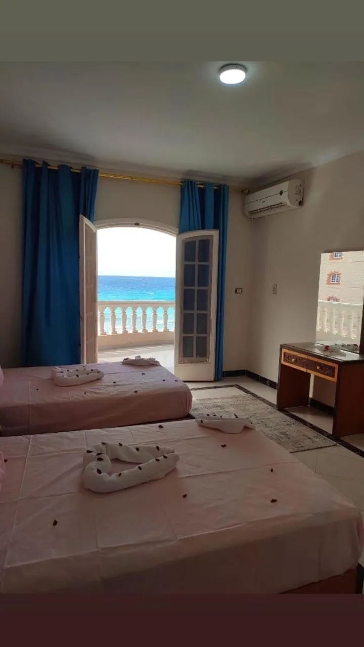 Bed in Ajami Hotel Armed Forces Apartments