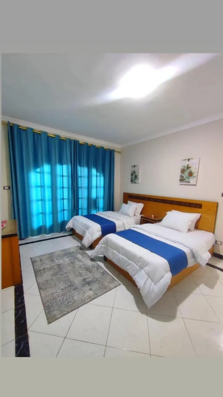 Bed in Ajami Hotel Armed Forces Apartments