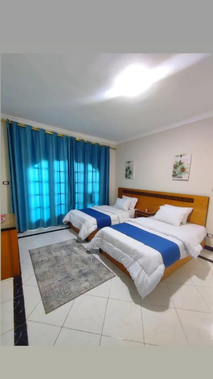 Bed in Ajami Hotel Armed Forces Apartments