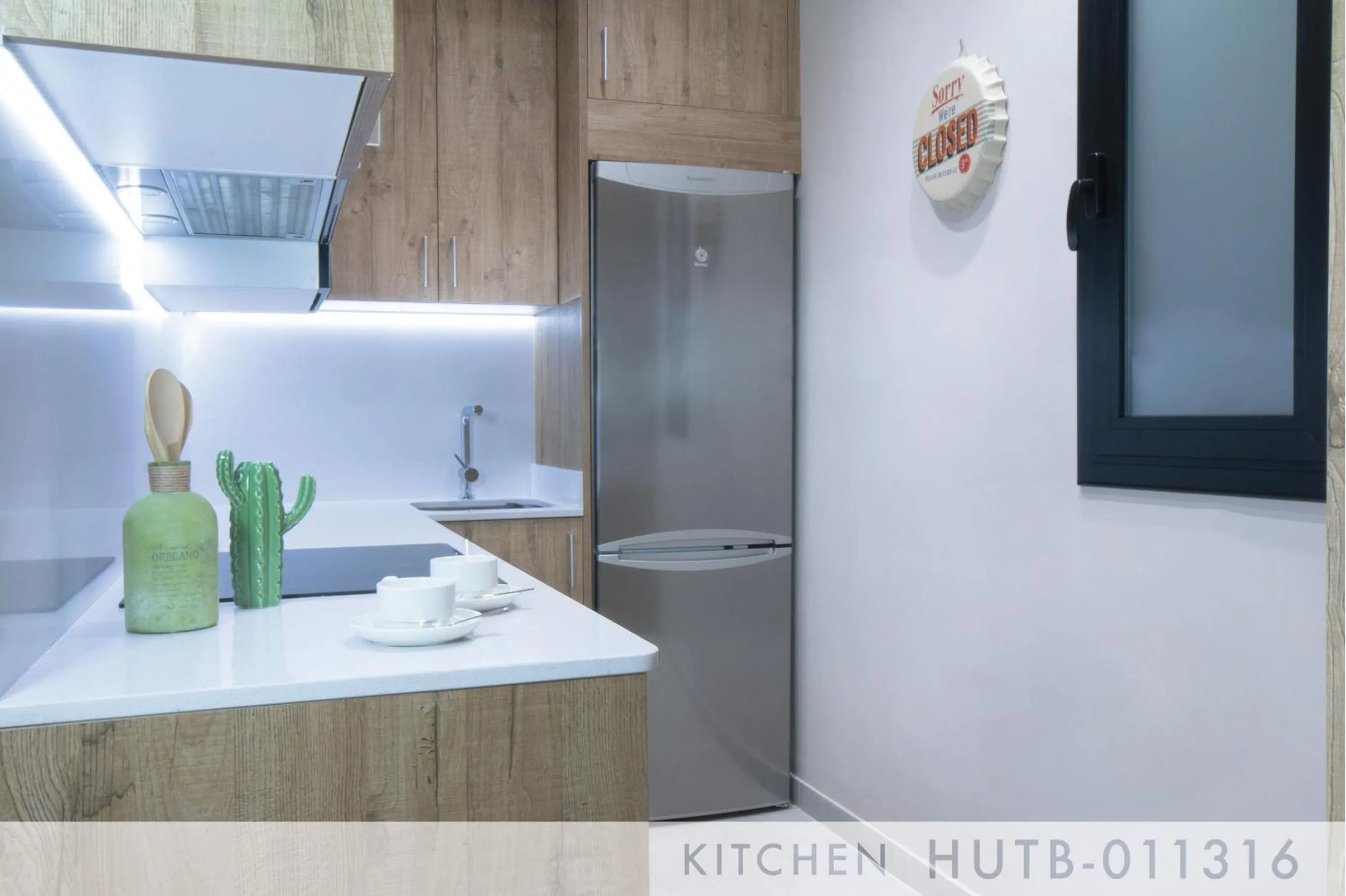 Kitchen or kitchenette in Suite Place Barcelona Còrsega