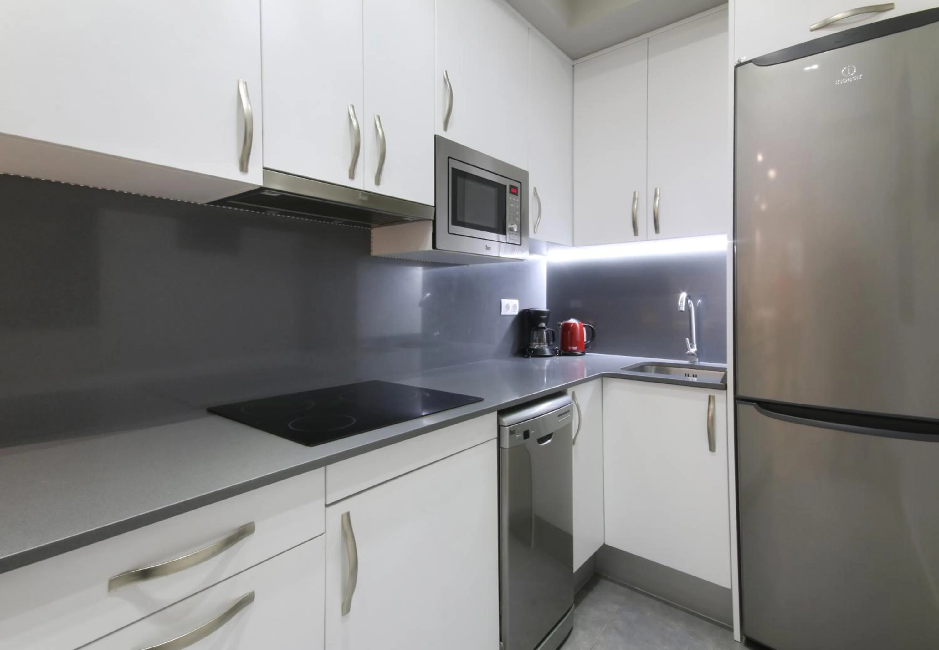 Kitchen or kitchenette in Suite Place Barcelona Còrsega