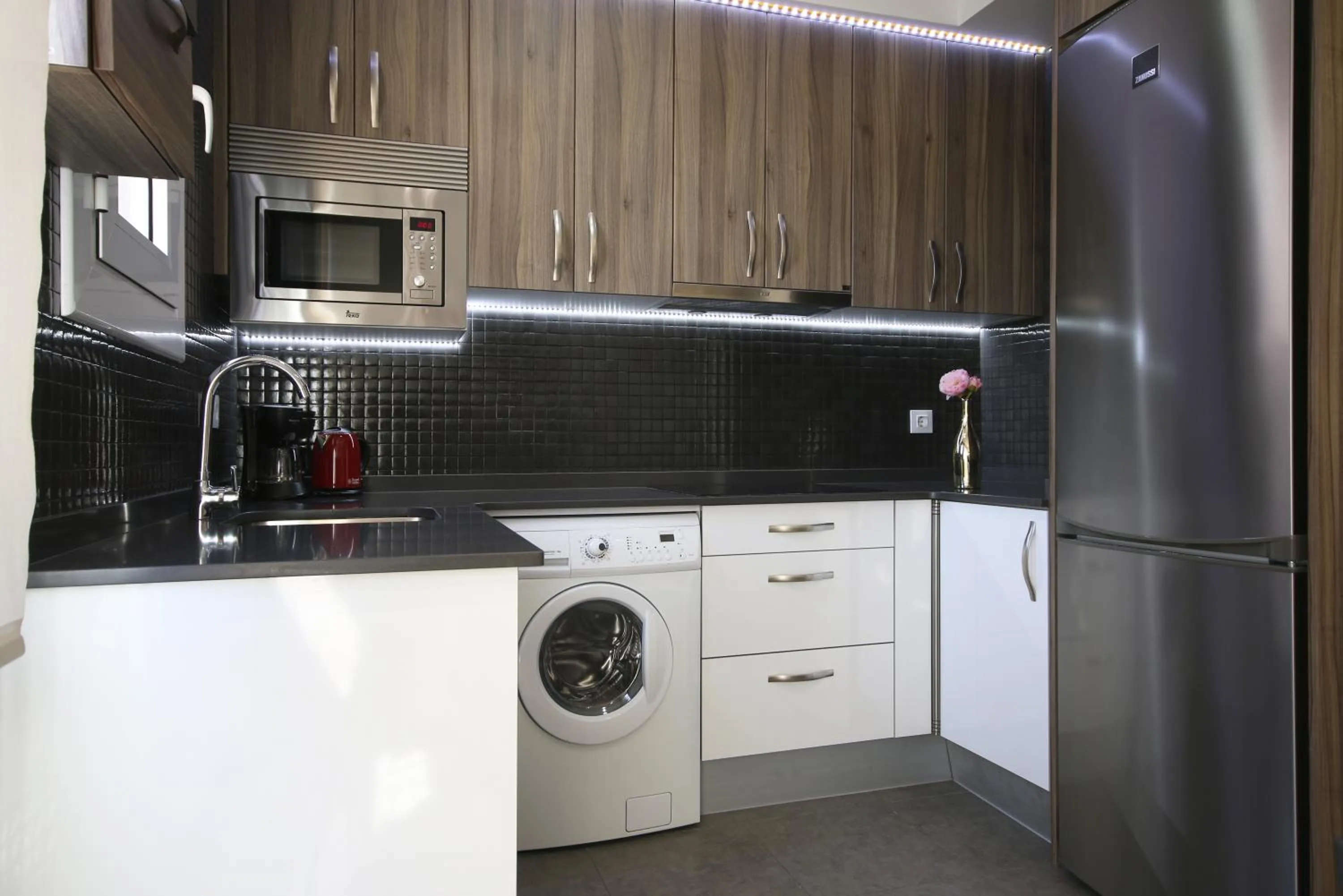 Kitchen or kitchenette in Suite Place Barcelona Còrsega