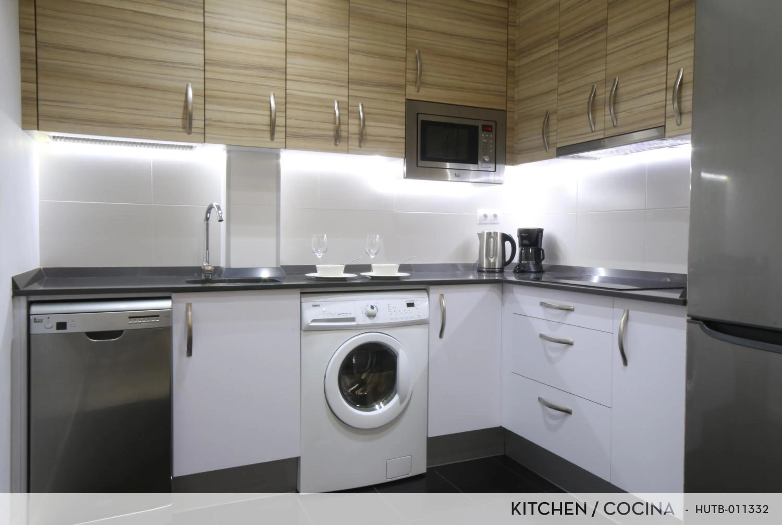 Kitchen or kitchenette in Suite Place Barcelona Còrsega