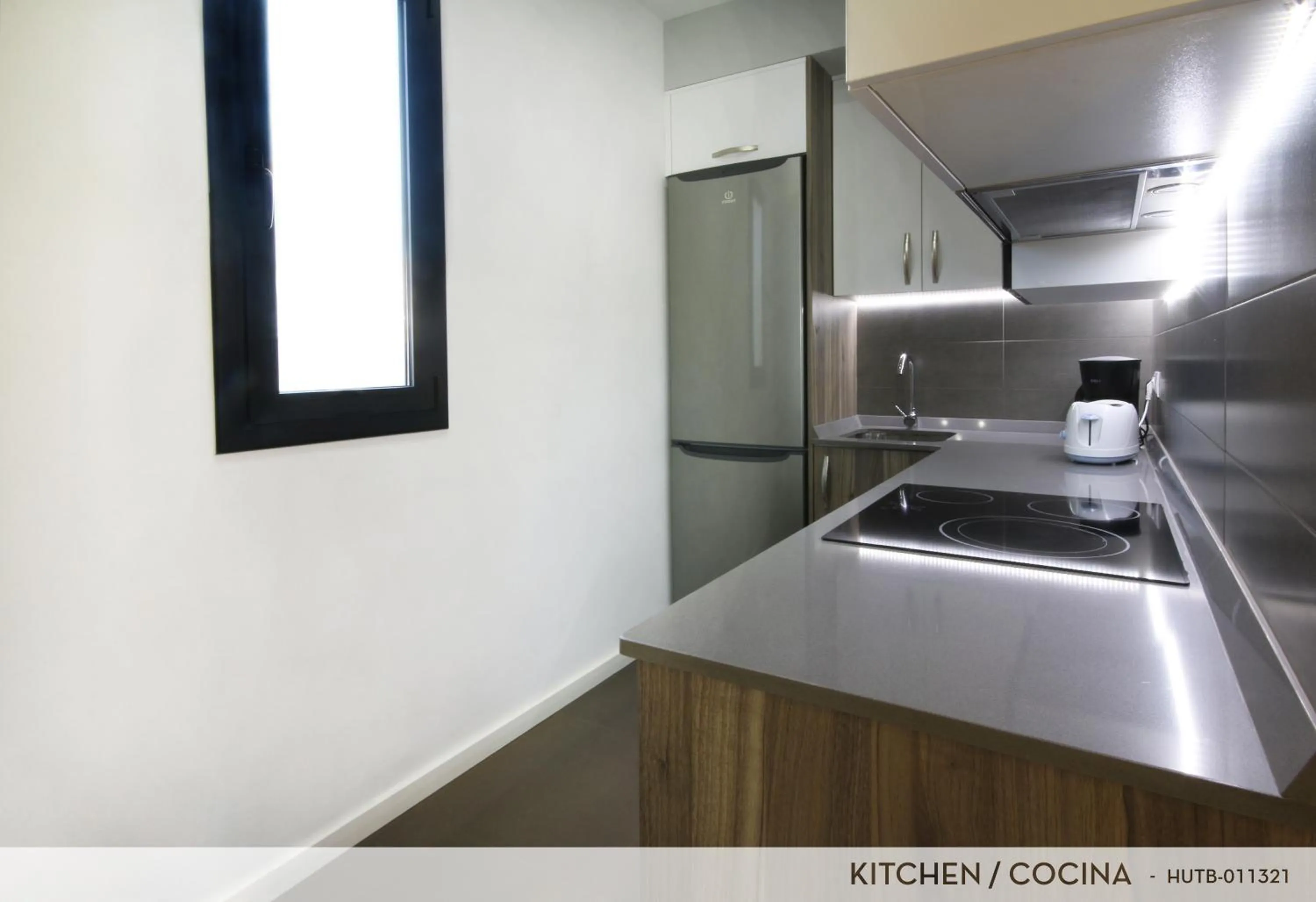 Kitchen or kitchenette in Suite Place Barcelona Còrsega
