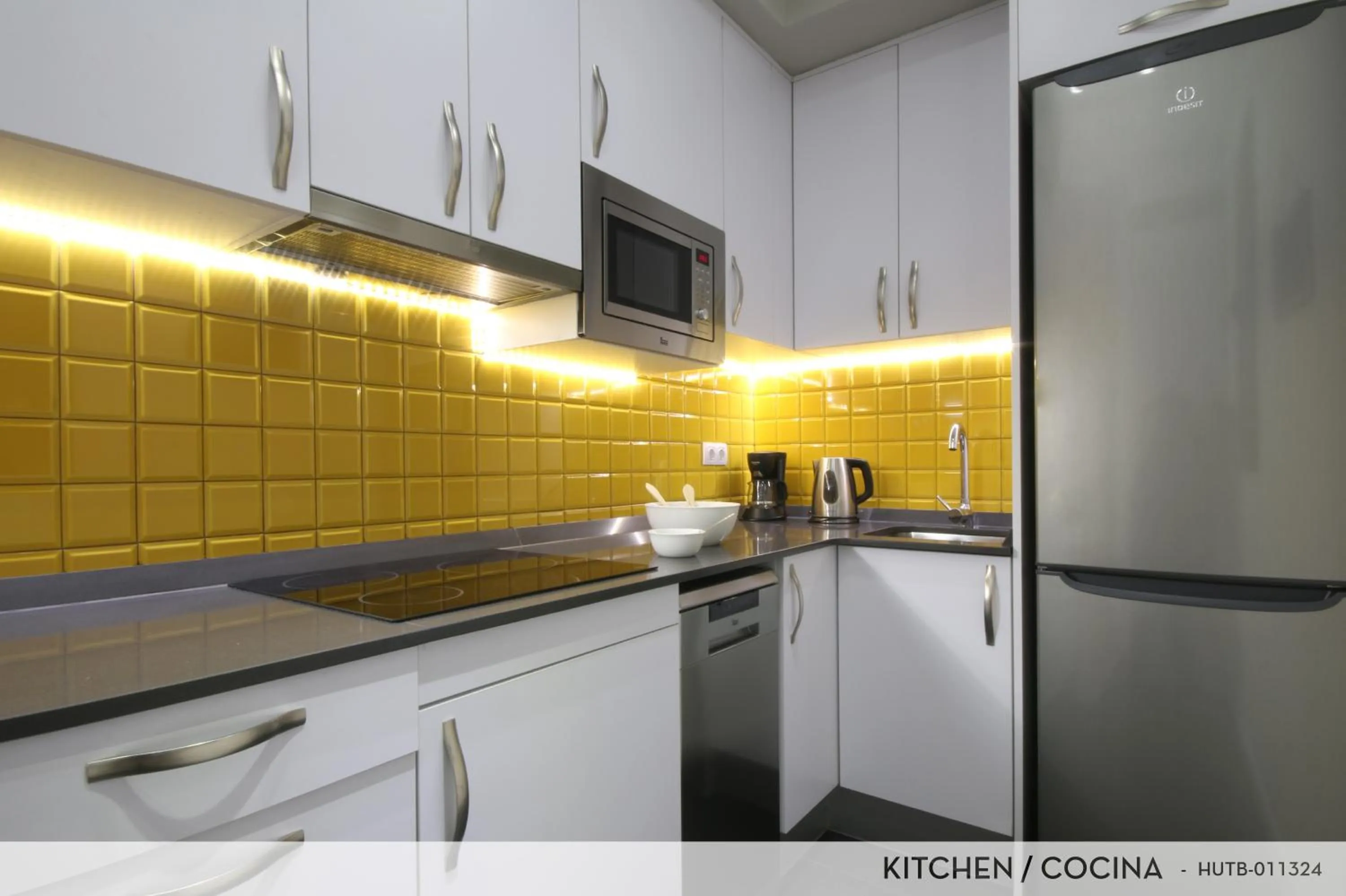 Kitchen or kitchenette in Suite Place Barcelona Còrsega