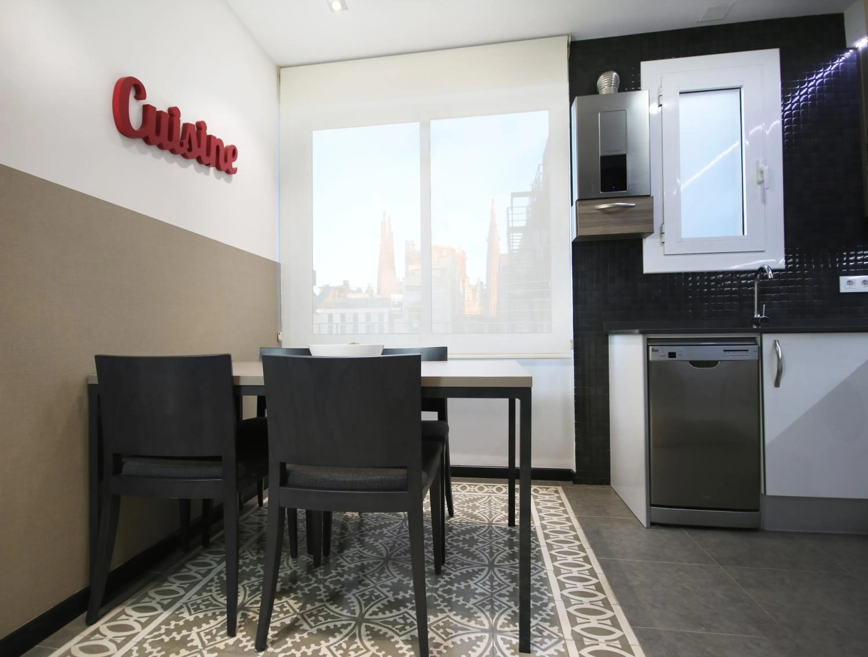 Kitchen or kitchenette in Suite Place Barcelona Còrsega