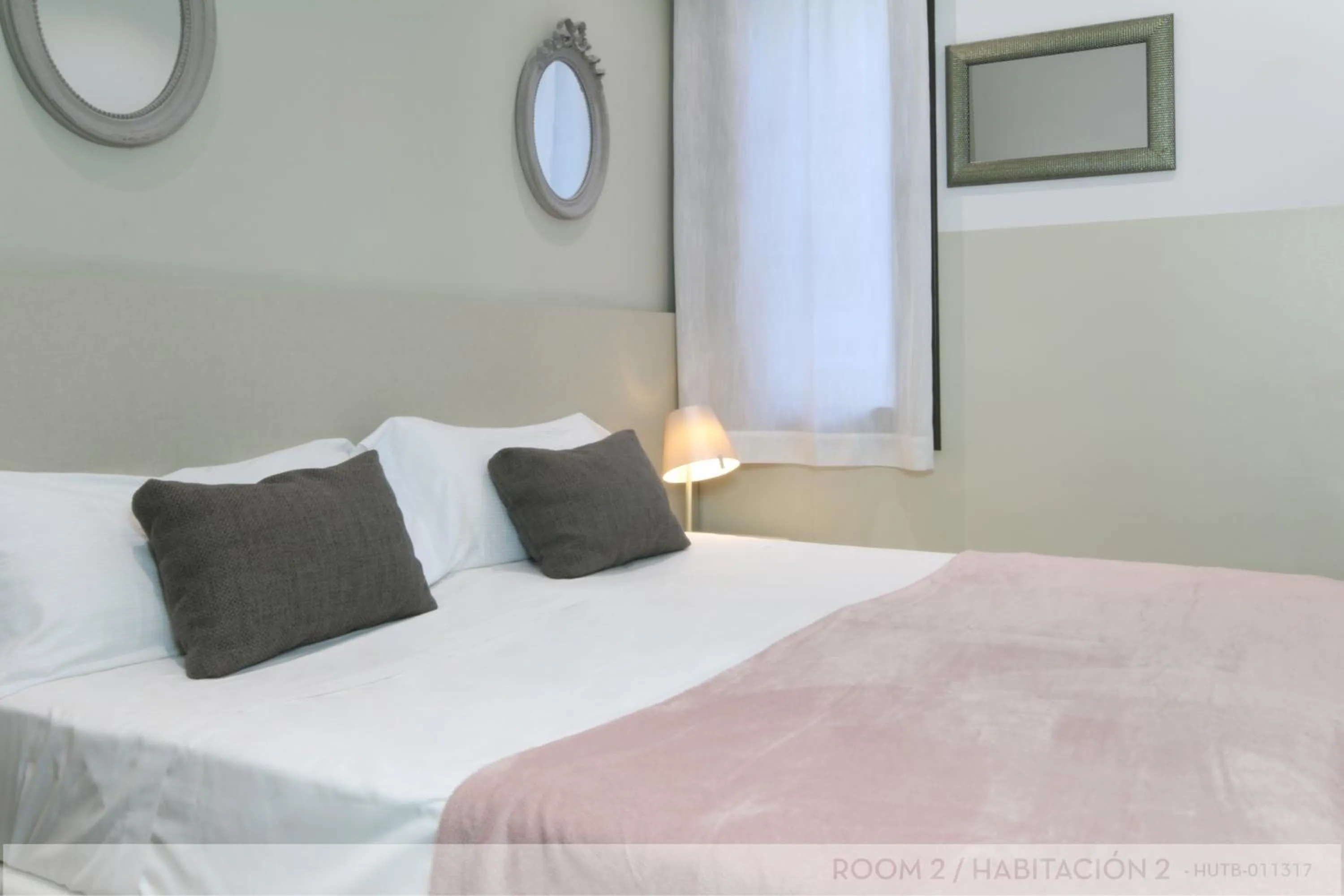 Bedroom, Bed in Suite Place Barcelona Còrsega