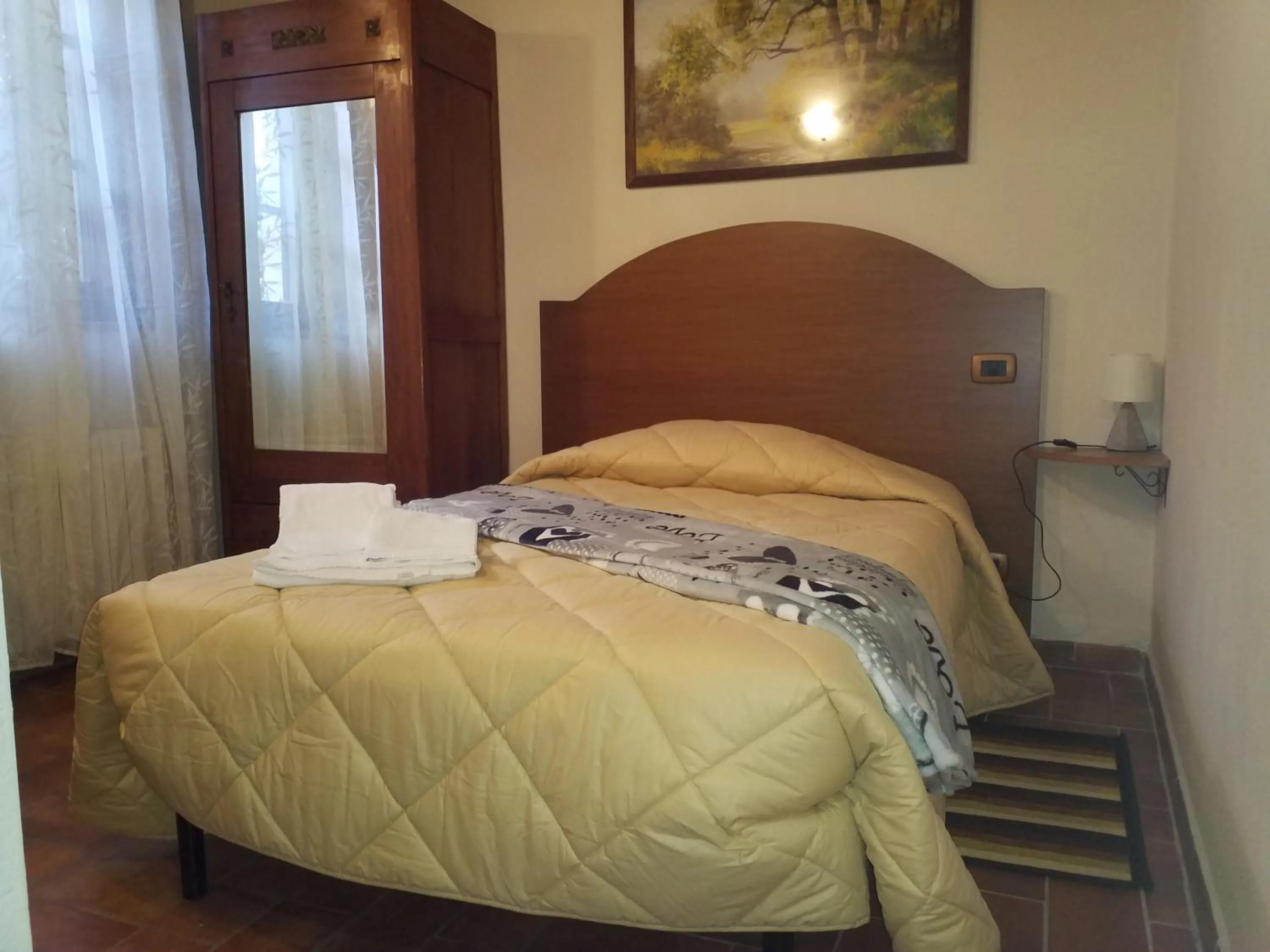 Photo of the whole room, Bed in Il Pozzo Di Sant'Andrea